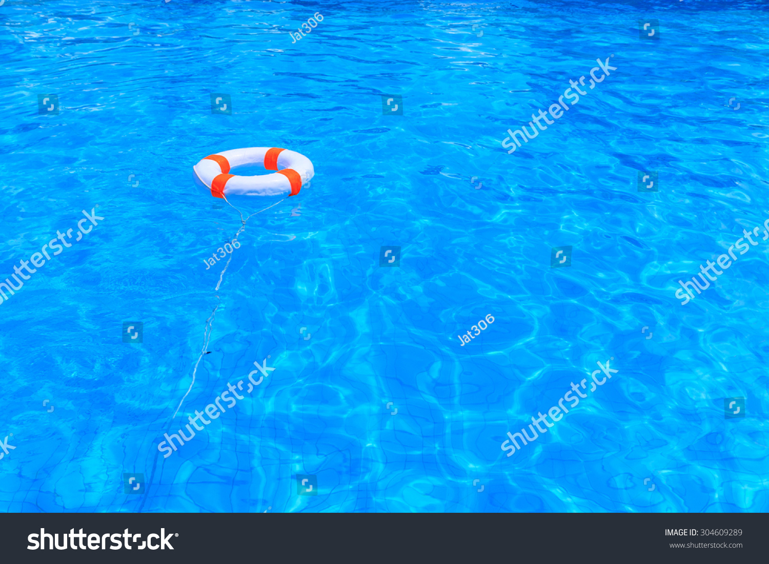 Life Buoy Floating In A Swimming Pool Stock Photo 304609289 : Shutterstock