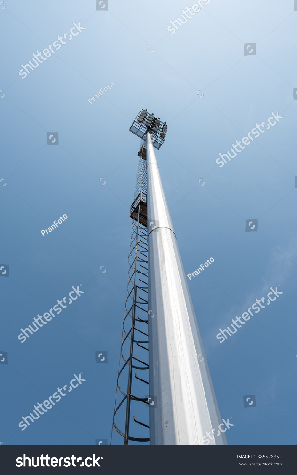 Light Pole Tower In Sport Arena On Blue Sky Stock Photo 385578352 ...