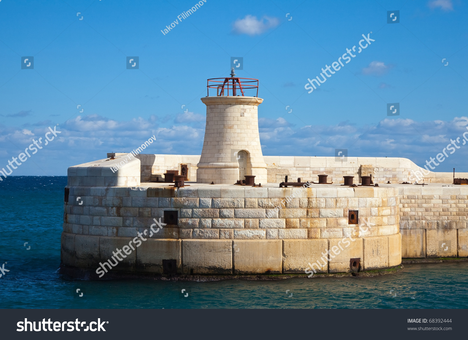 Lighthouse At Entrance In Grand Harbour (Valletta, Malta) Stock Photo ...