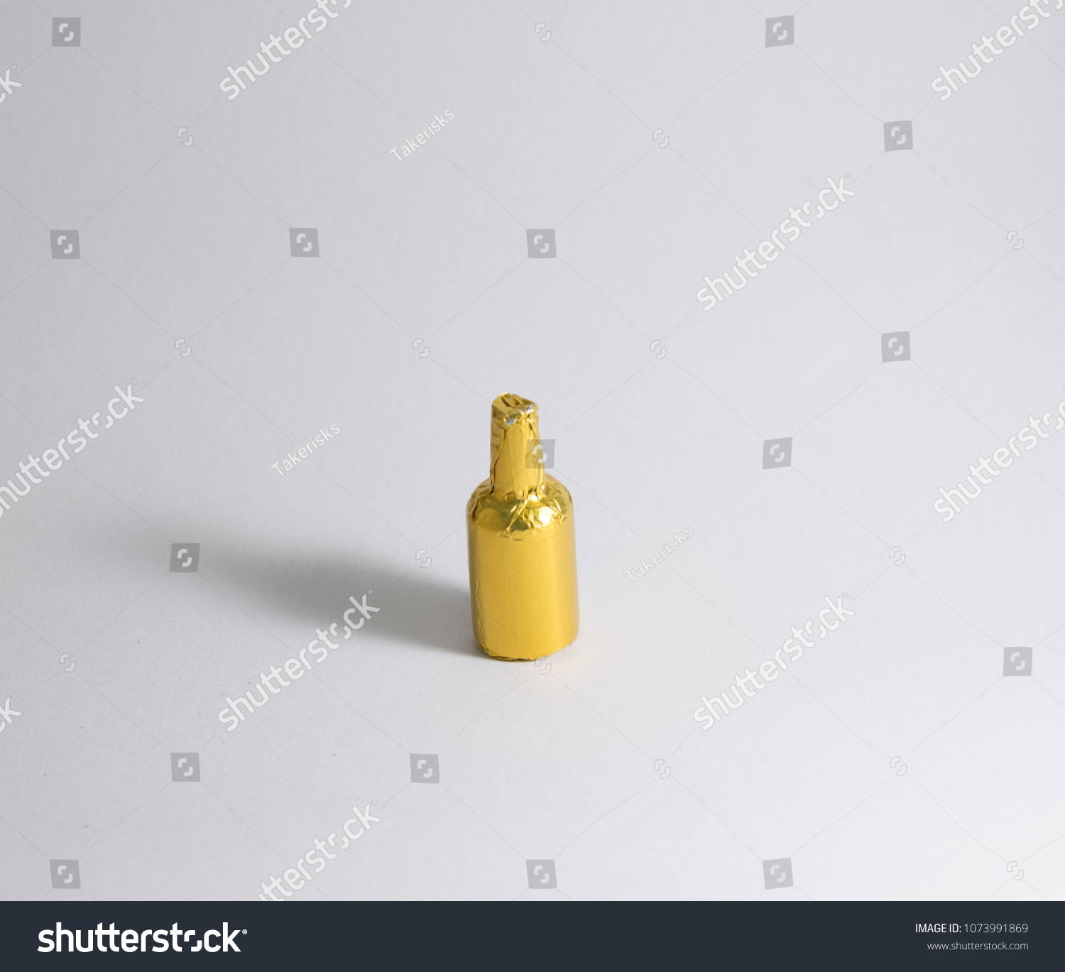 Download Liquor Bottles Wrapped Yellow Paper Stock Photo Edit Now 1073991869 PSD Mockup Templates