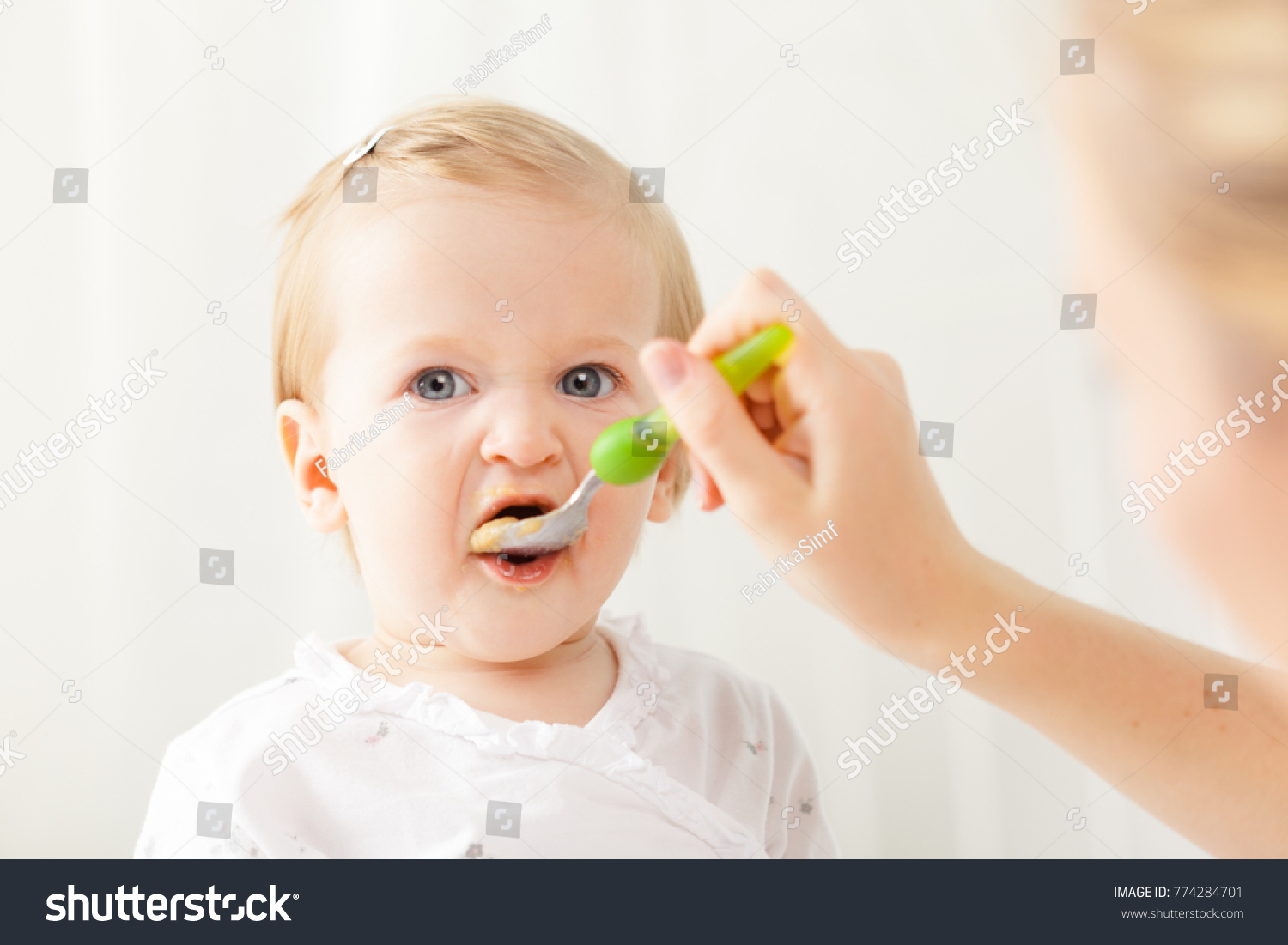 baby feeding with spoon