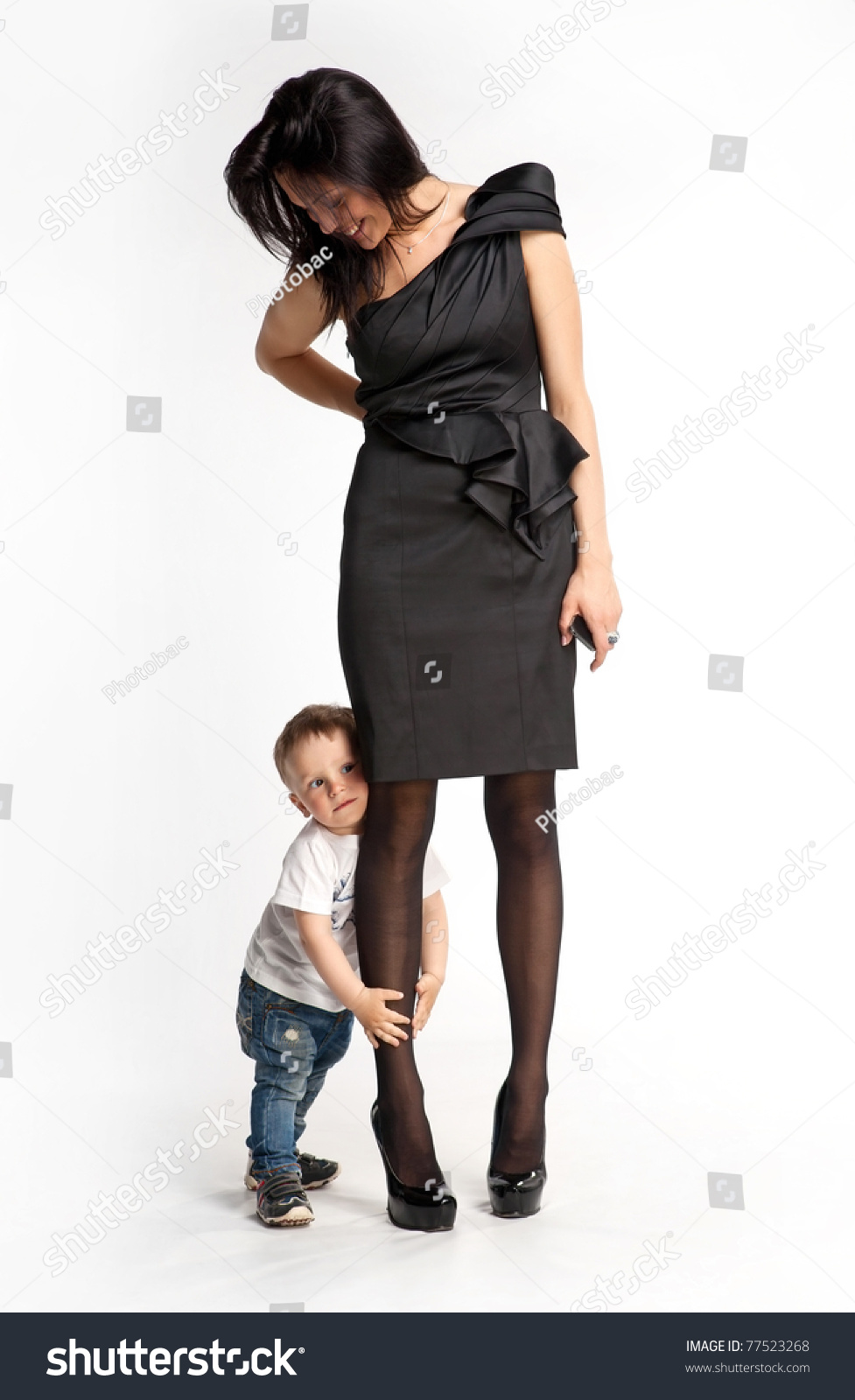 stock-photo-little-boy-clinging-to-mother-s-leg-unwilling-let-her-go-77523268.jpg