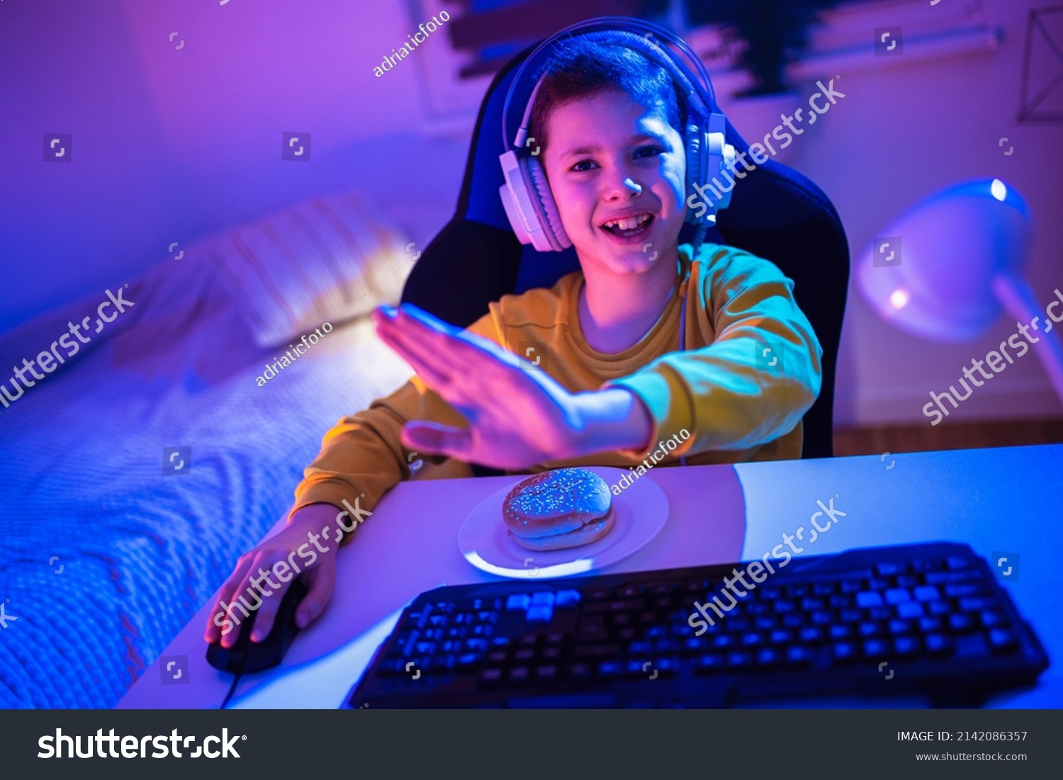 little-boy-playing-video-game-dark-stock-photo-2142086357-shutterstock