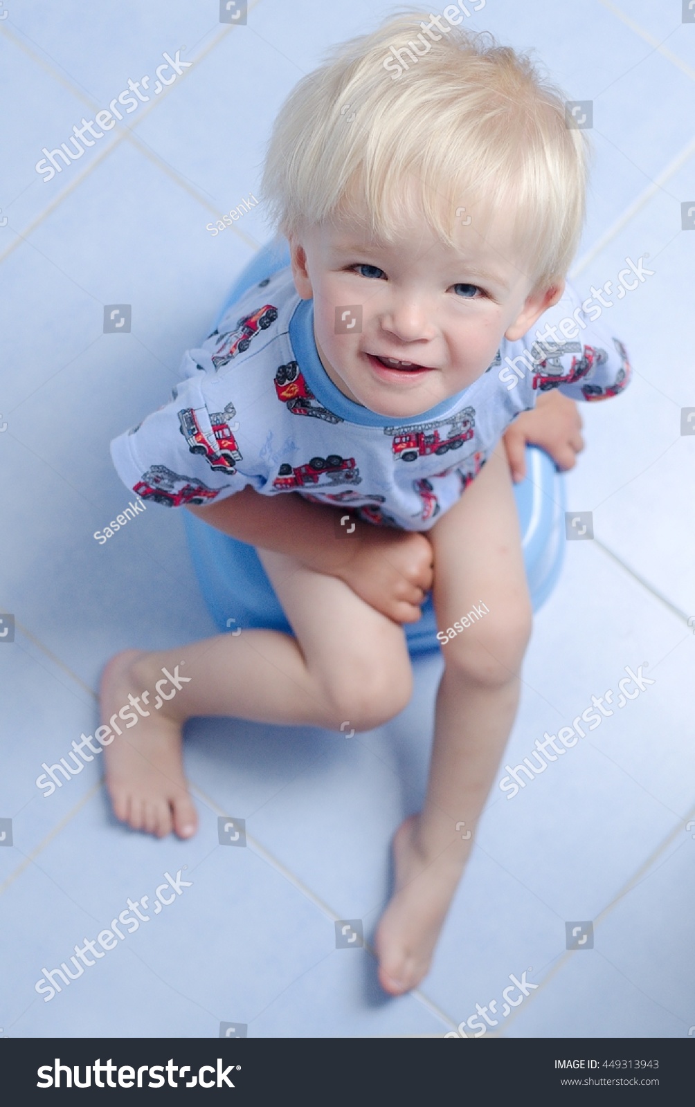 little boy sitting on potty toddler stock photo edit now 449313943 cars toddler potty