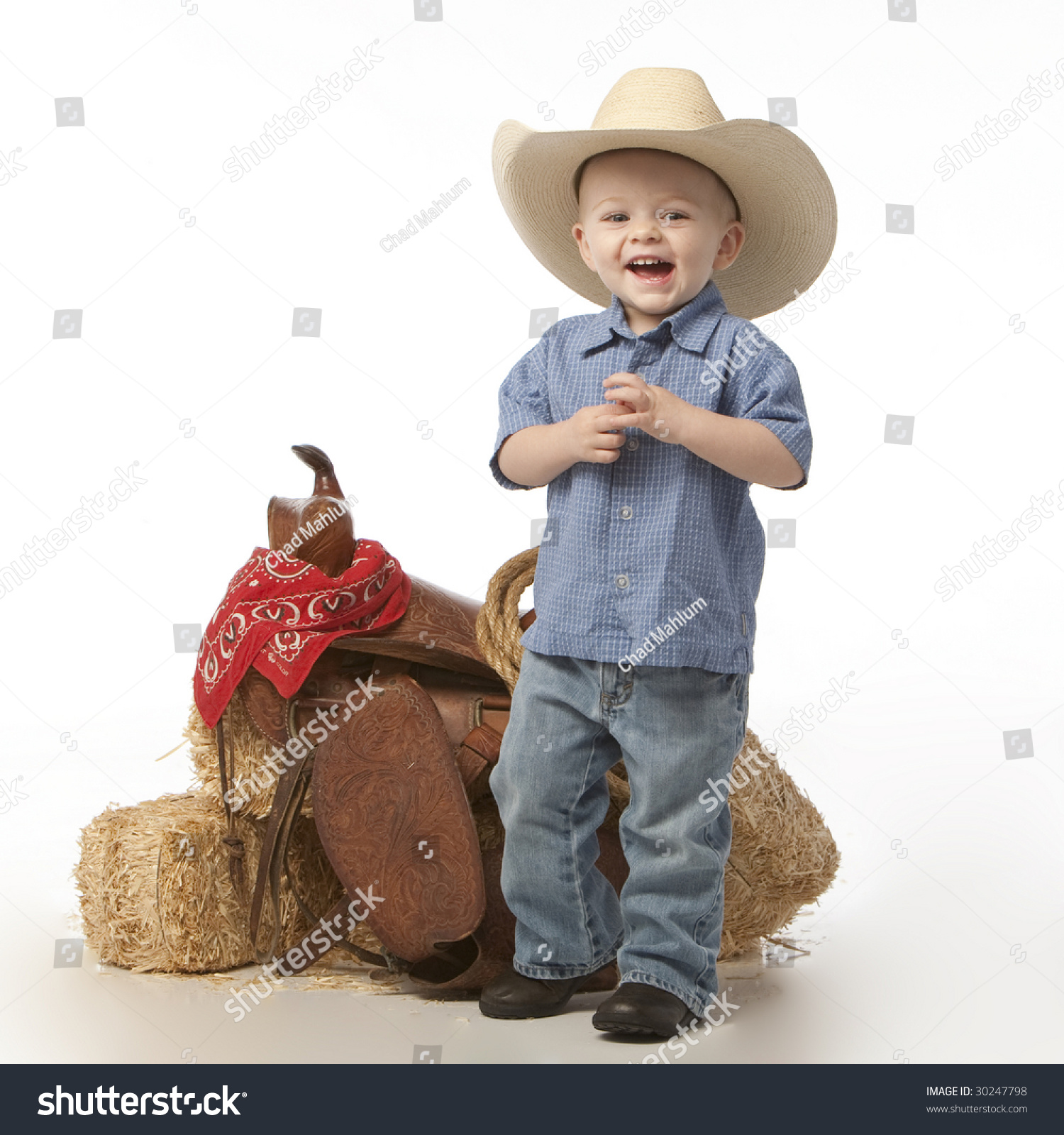 Little Cowboy With Saddle Stock Photo 30247798 : Shutterstock