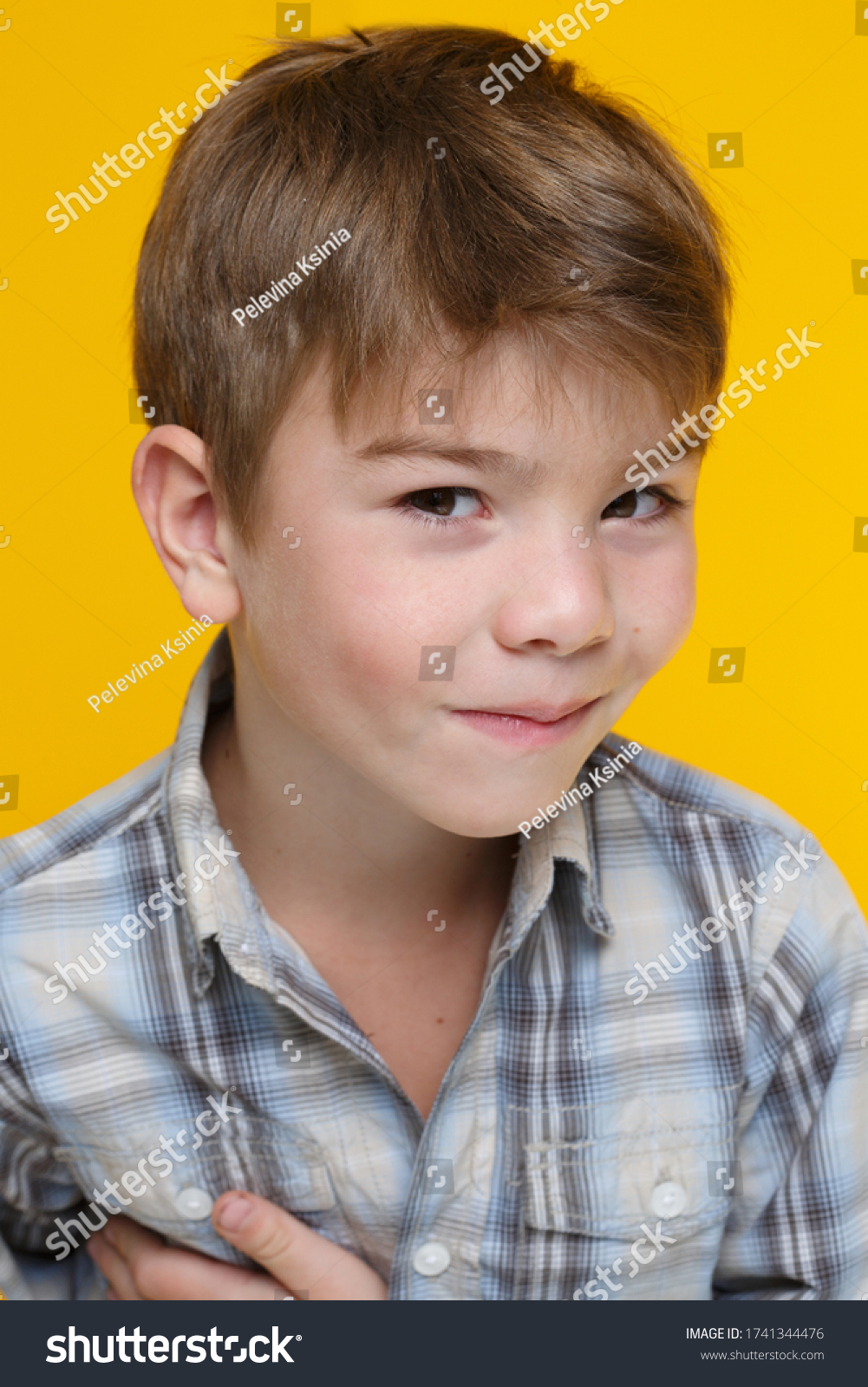 little-cute-boy-plaid-shirt-isolated-stock-photo-1741344476-shutterstock