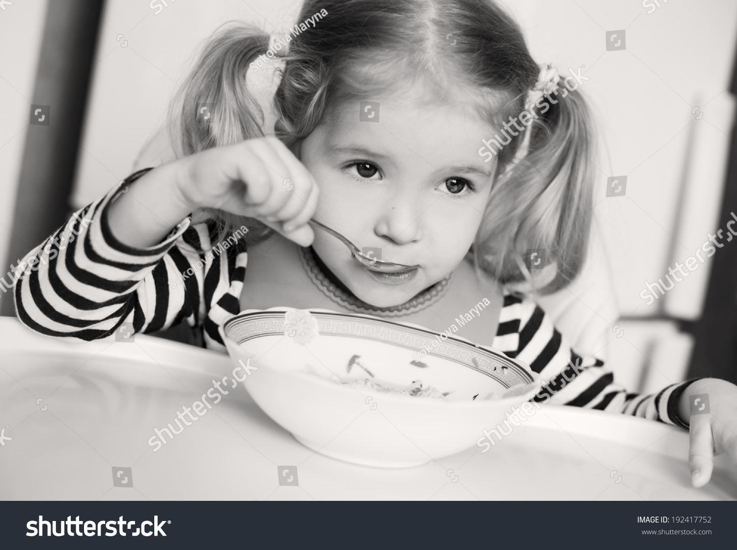 Little Girl Eating Soup On A White Background ( Black And White ) Stock ...