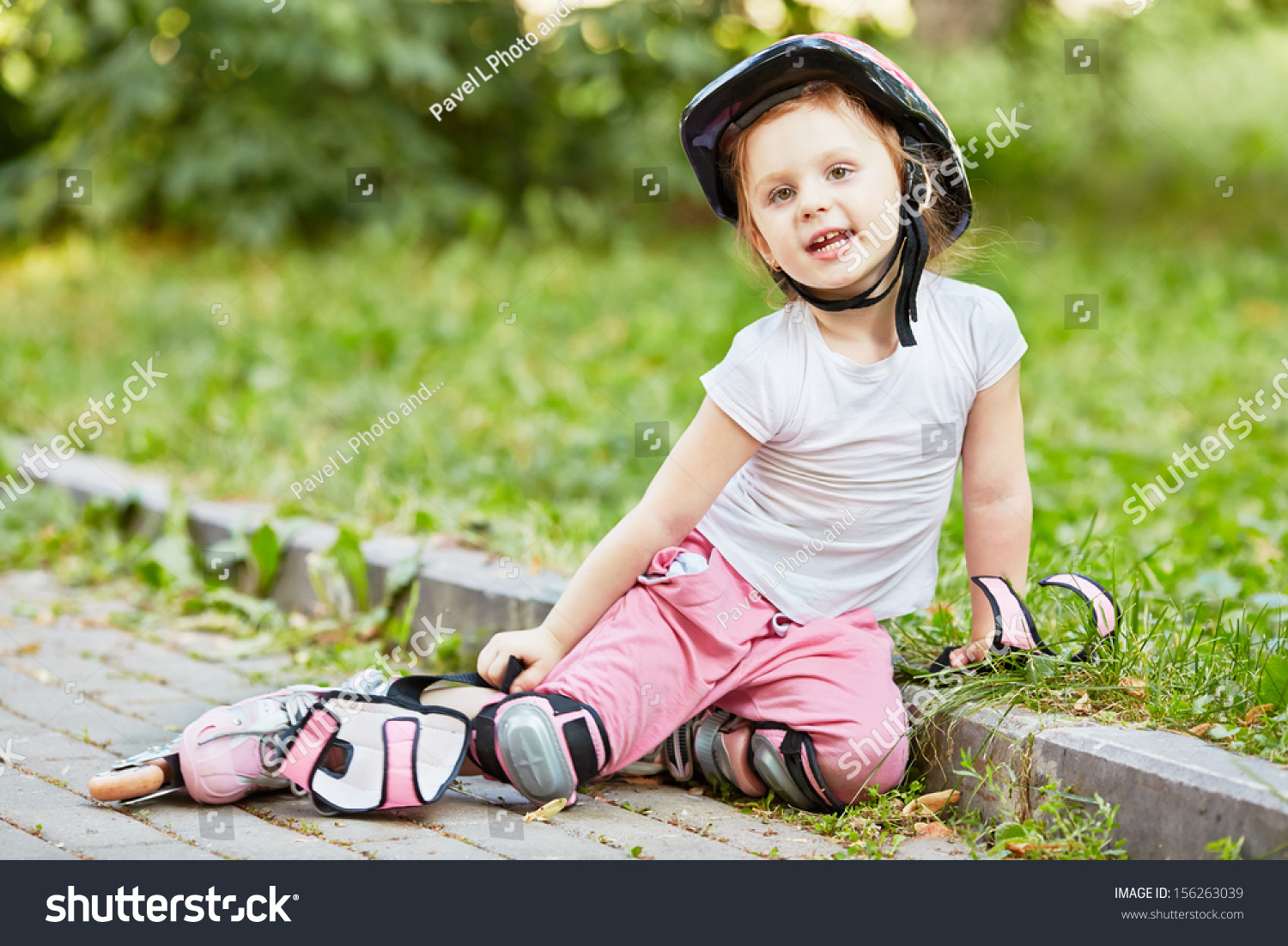 Little Girl Protective Equipment Rollers Sits Stock Photo 156263039 ...