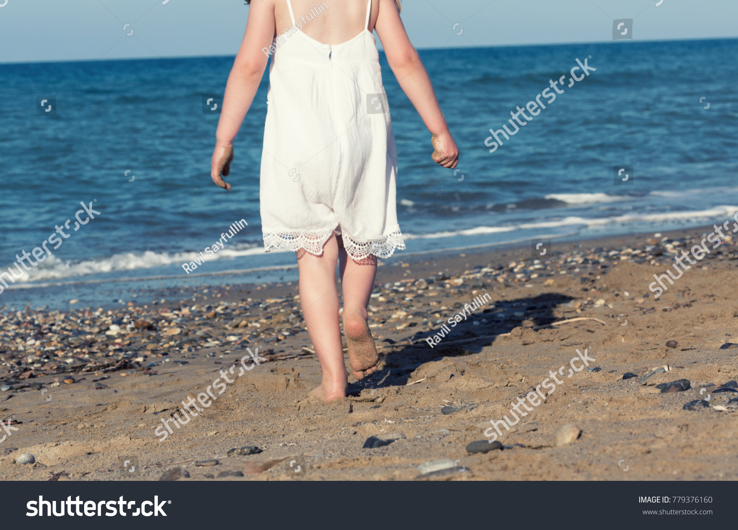 little white dress by the shore