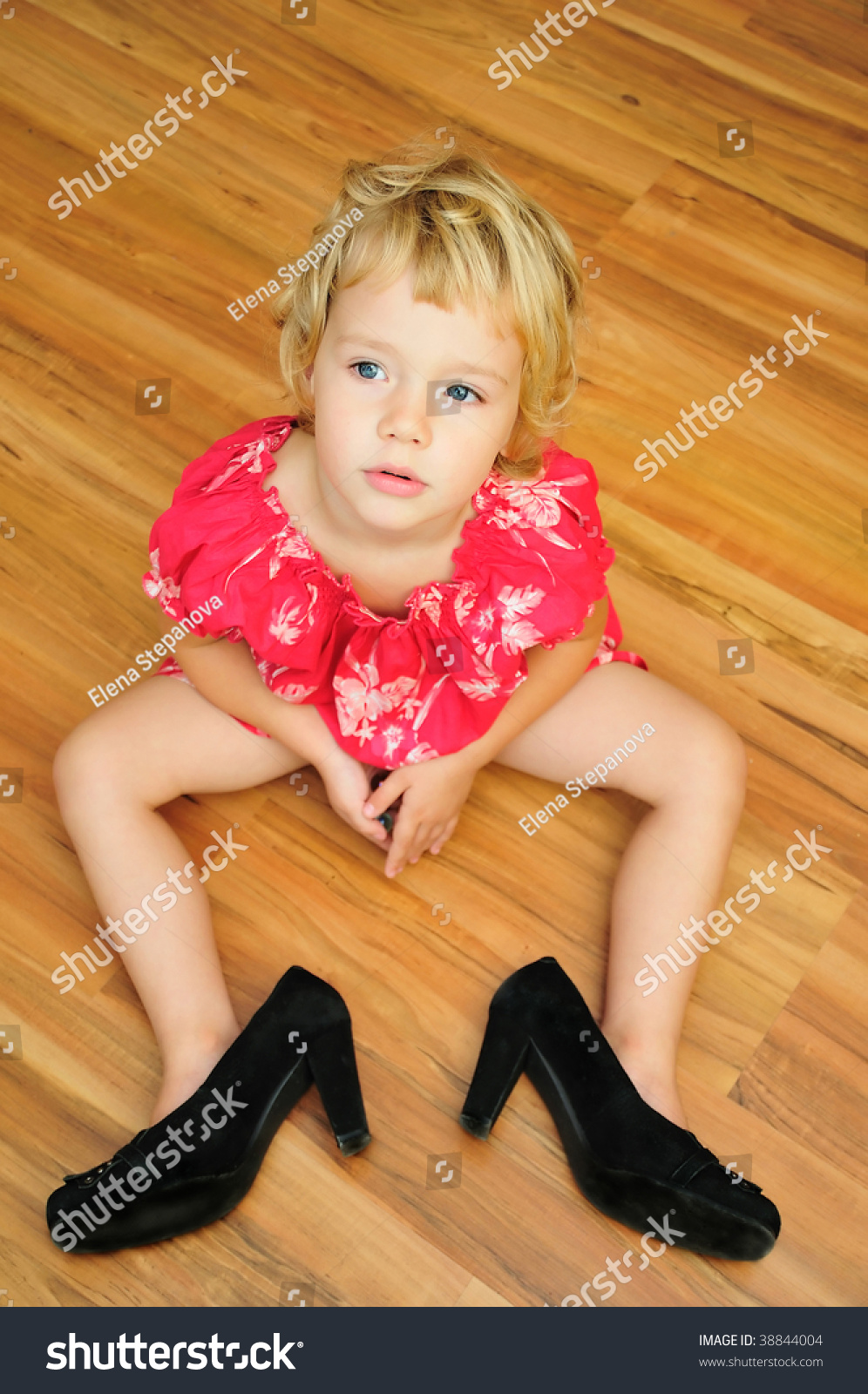little girl wearing heels