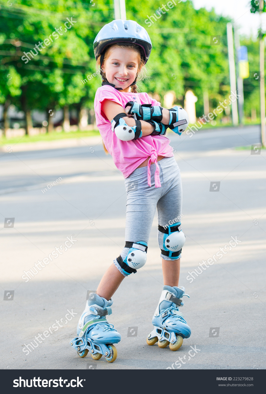 Little Girl On Roller Skates At Park Stock Photo 223279828 : Shutterstock