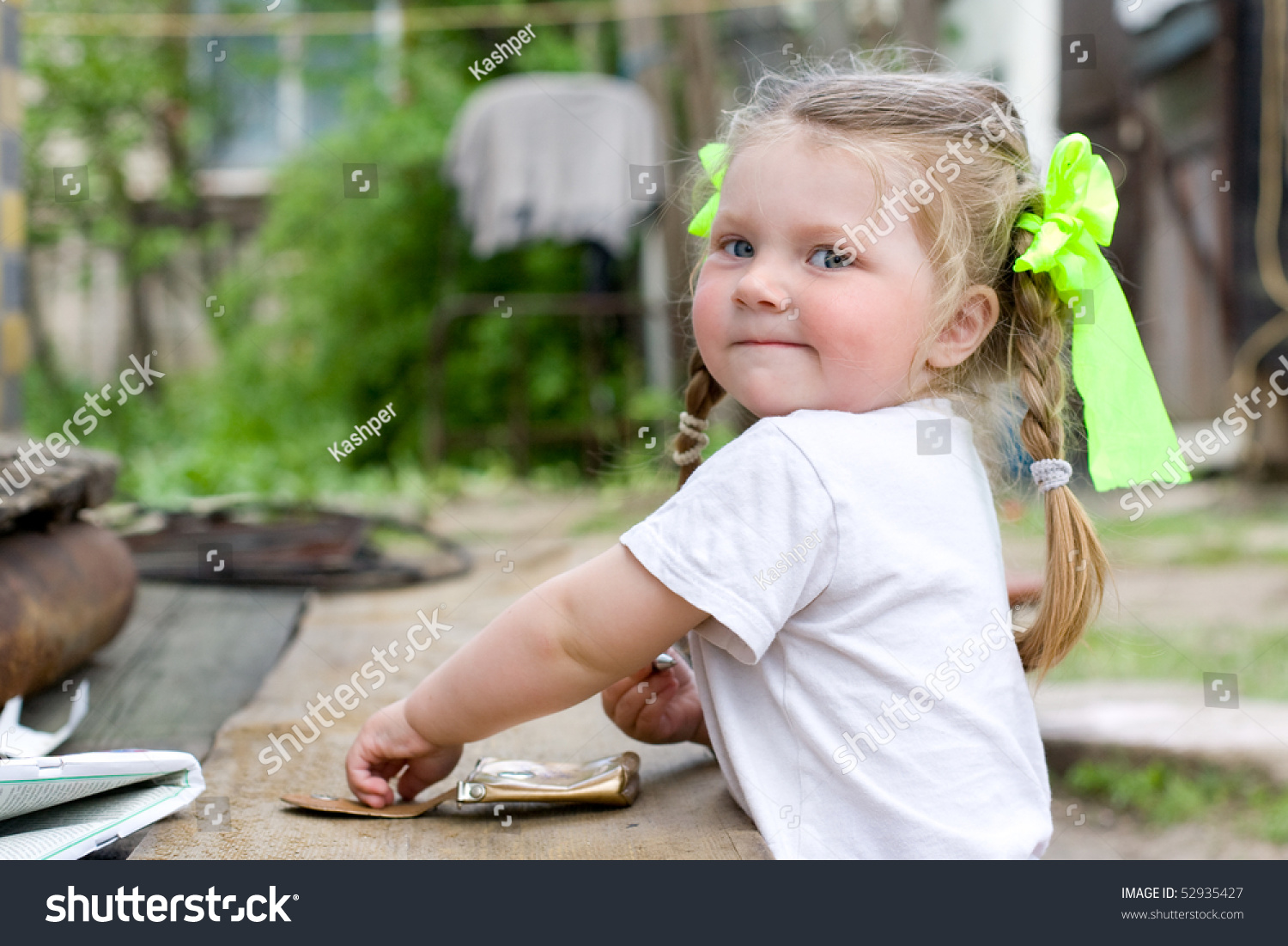 Little Girl Playing In The Garden Stock Photo 52935427 : Shutterstock