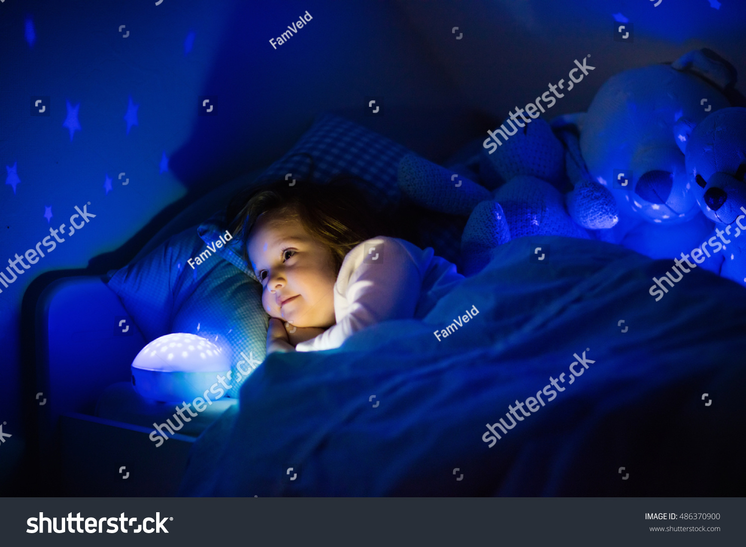 Little Girl Reading Book Bed Dark Stock Image Download Now