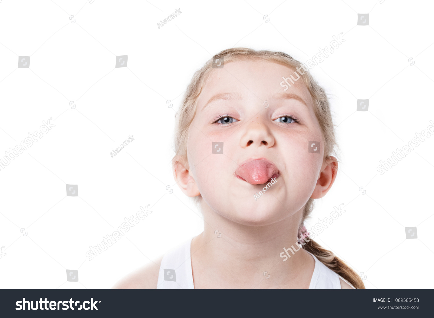 Little Girl Showing Tongue Isolated On Stock Photo (Edit Now) 1089585458