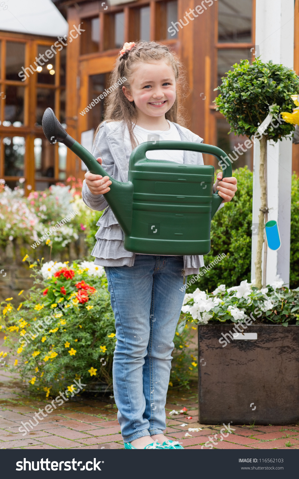 Little Girl Standing Garden Center Holding Stock Photo (Edit Now) 116562103