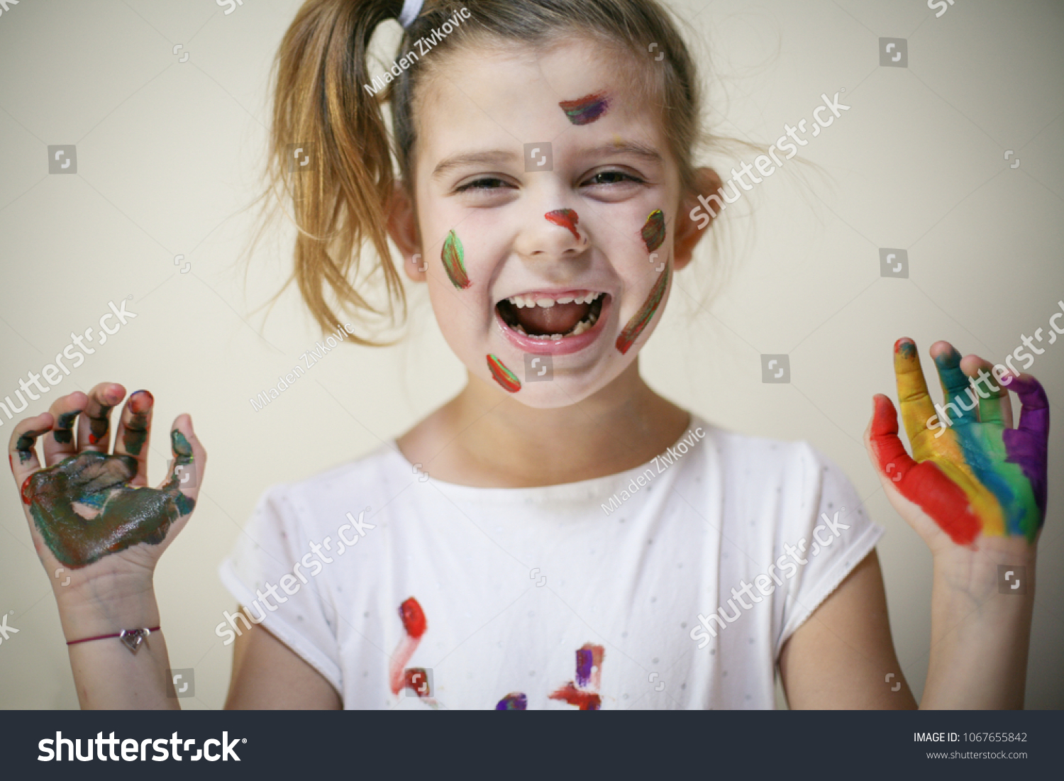 Little Girl Hands Face Covered Paint Stock Photo 1067655842 | Shutterstock