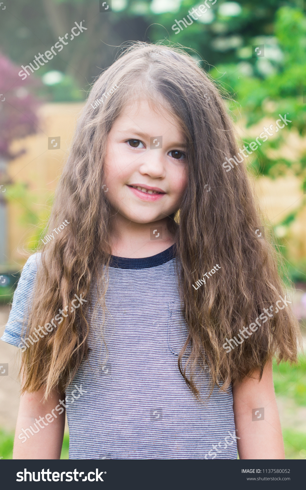 Little Girl Long Wavy Hair Garden Stock Image Download Now