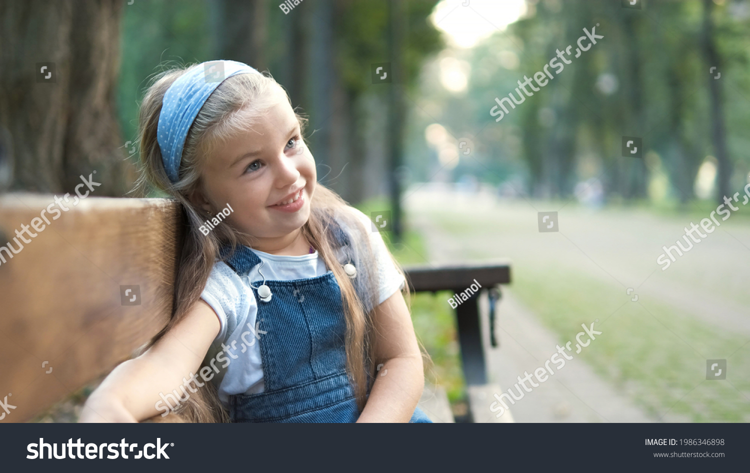 Little Happy Child Girl Sitting On Stock Photo 1986346898 | Shutterstock