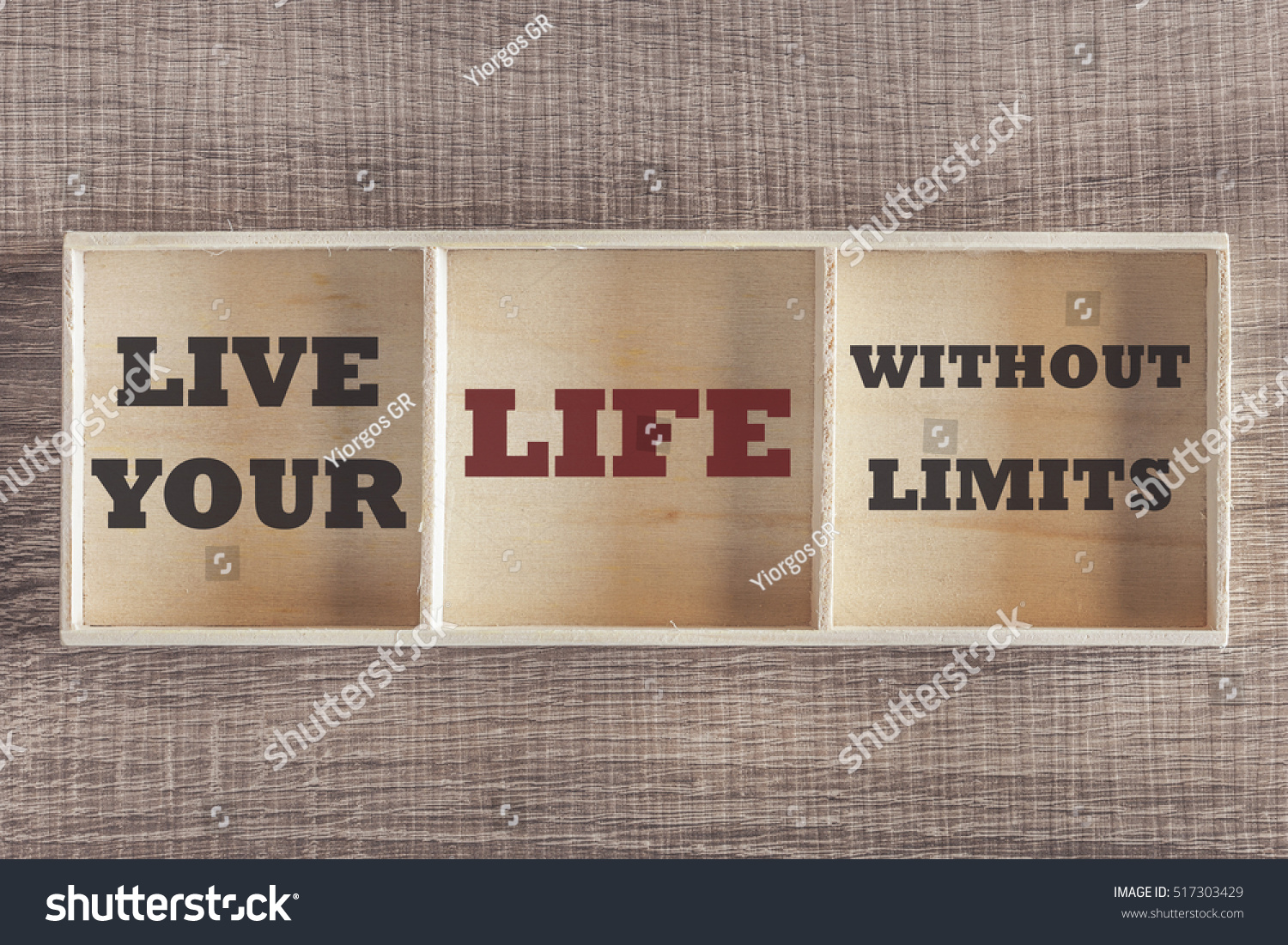 Live your life without limits Motivational quote written on wooden box Retro toned