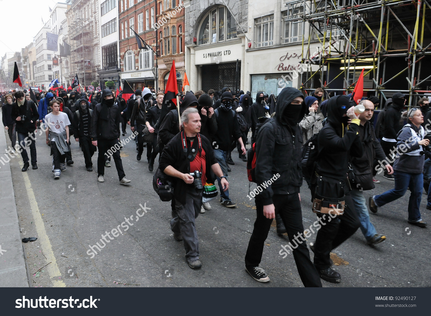 London - March 26: A Breakaway Group Of Protesters March Through The ...