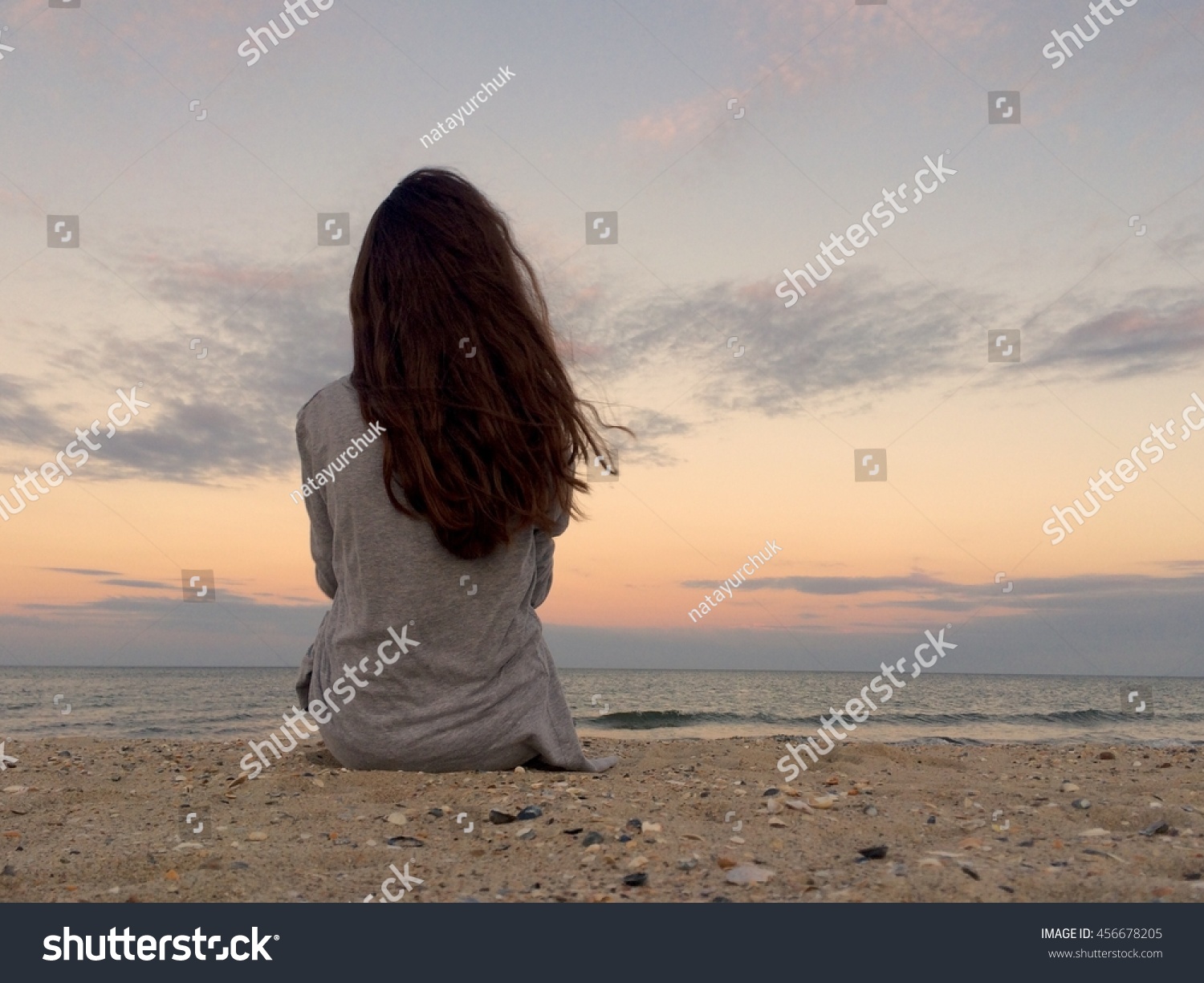Lonely Girl On Beach Stock Photo 456678205 - Shutterstock-7753