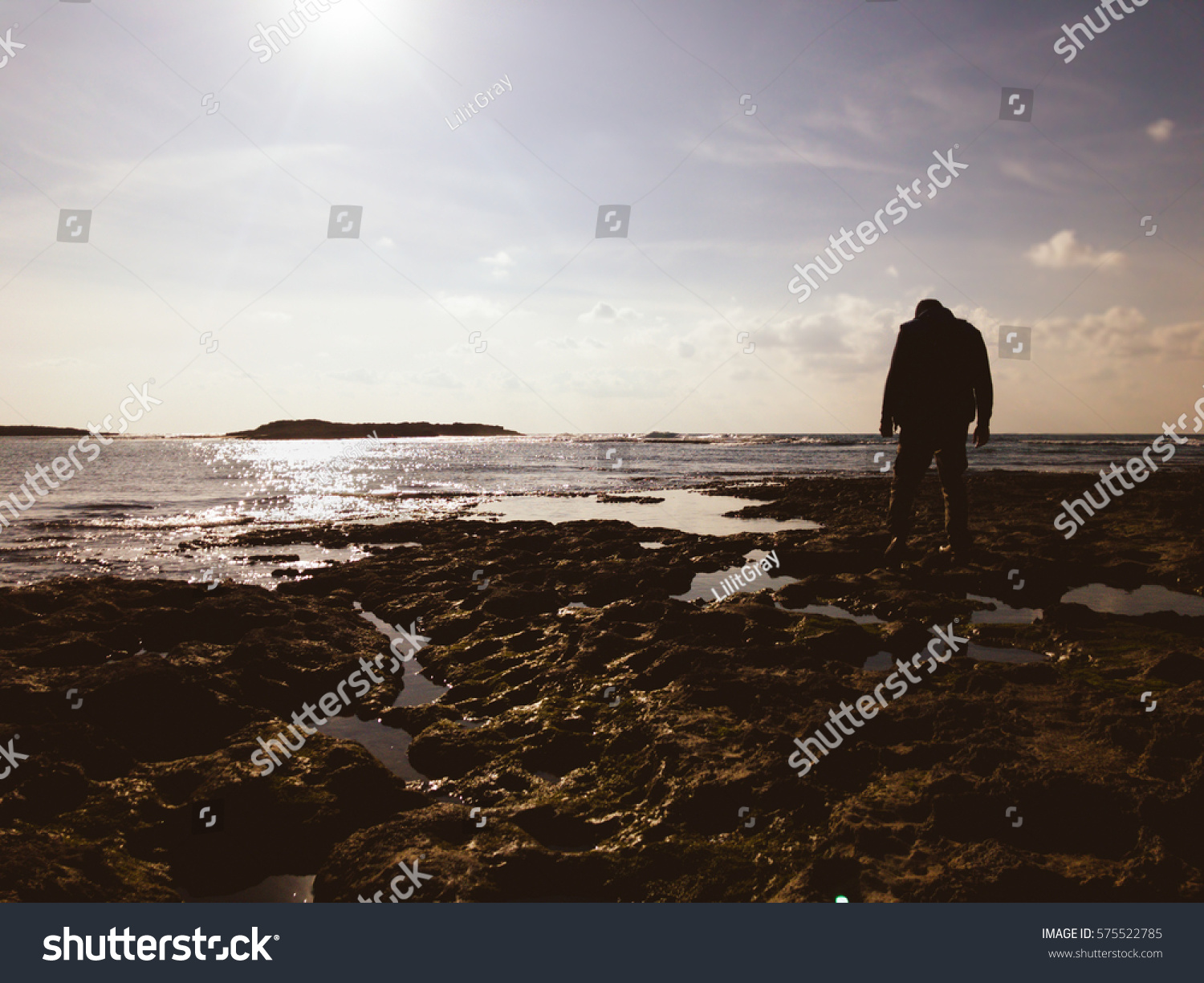 Lonely Man Walk On Rocky Surface Stock Photo 575522785 | Shutterstock