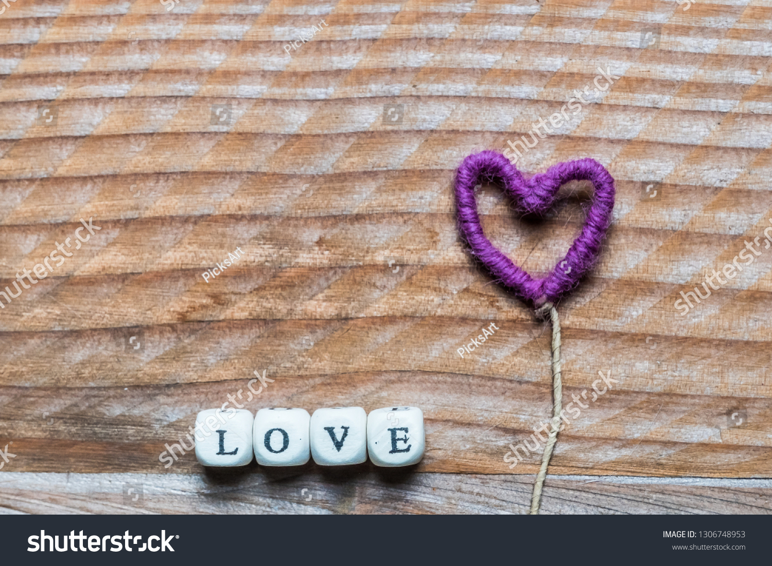 Love Written Wooden Letters Purple Heart Stock Photo Edit Now 1306748953