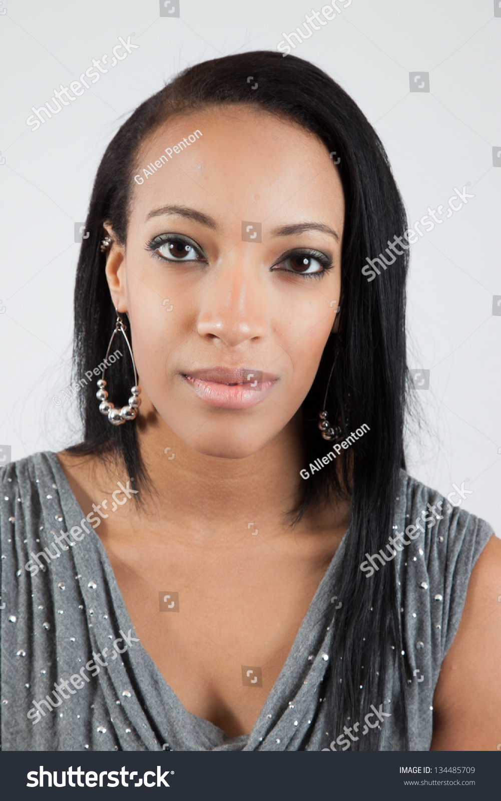 Lovely African American Woman Looking At The Camera With A Serious ...