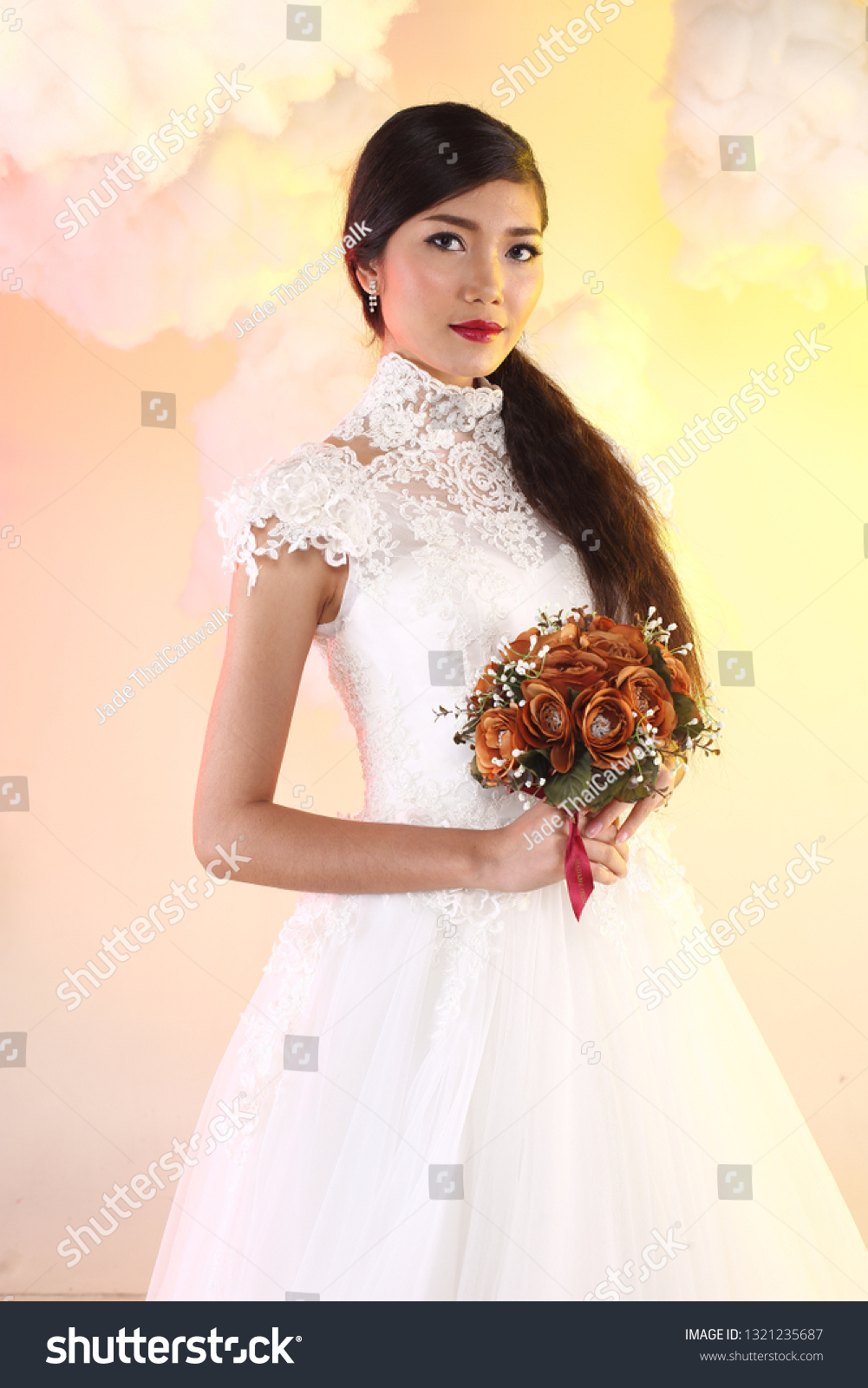 https://image.shutterstock.com/z/stock-photo-lovely-asian-beautiful-woman-bride-in-white-wedding-gown-dress-with-lace-veil-black-hair-studio-1321235687.jpg