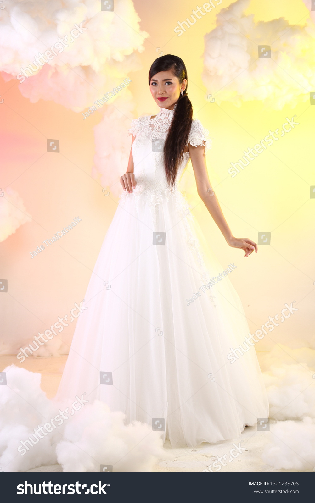 https://image.shutterstock.com/z/stock-photo-lovely-asian-beautiful-woman-bride-in-white-wedding-gown-dress-with-lace-veil-black-hair-studio-1321235708.jpg