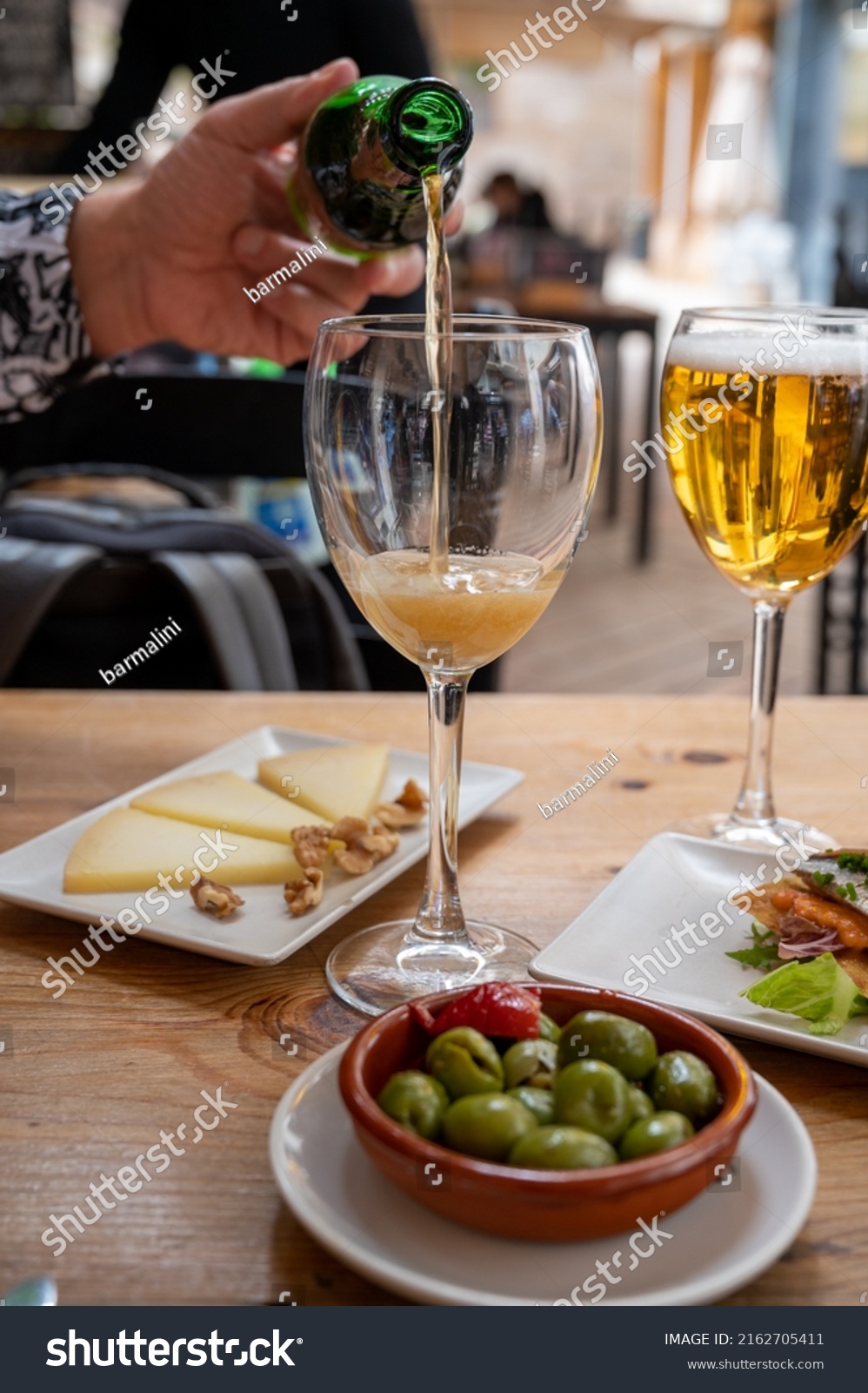 lunch-cold-beer-spanish-outdoor-cafe-stock-photo-2162705411-shutterstock