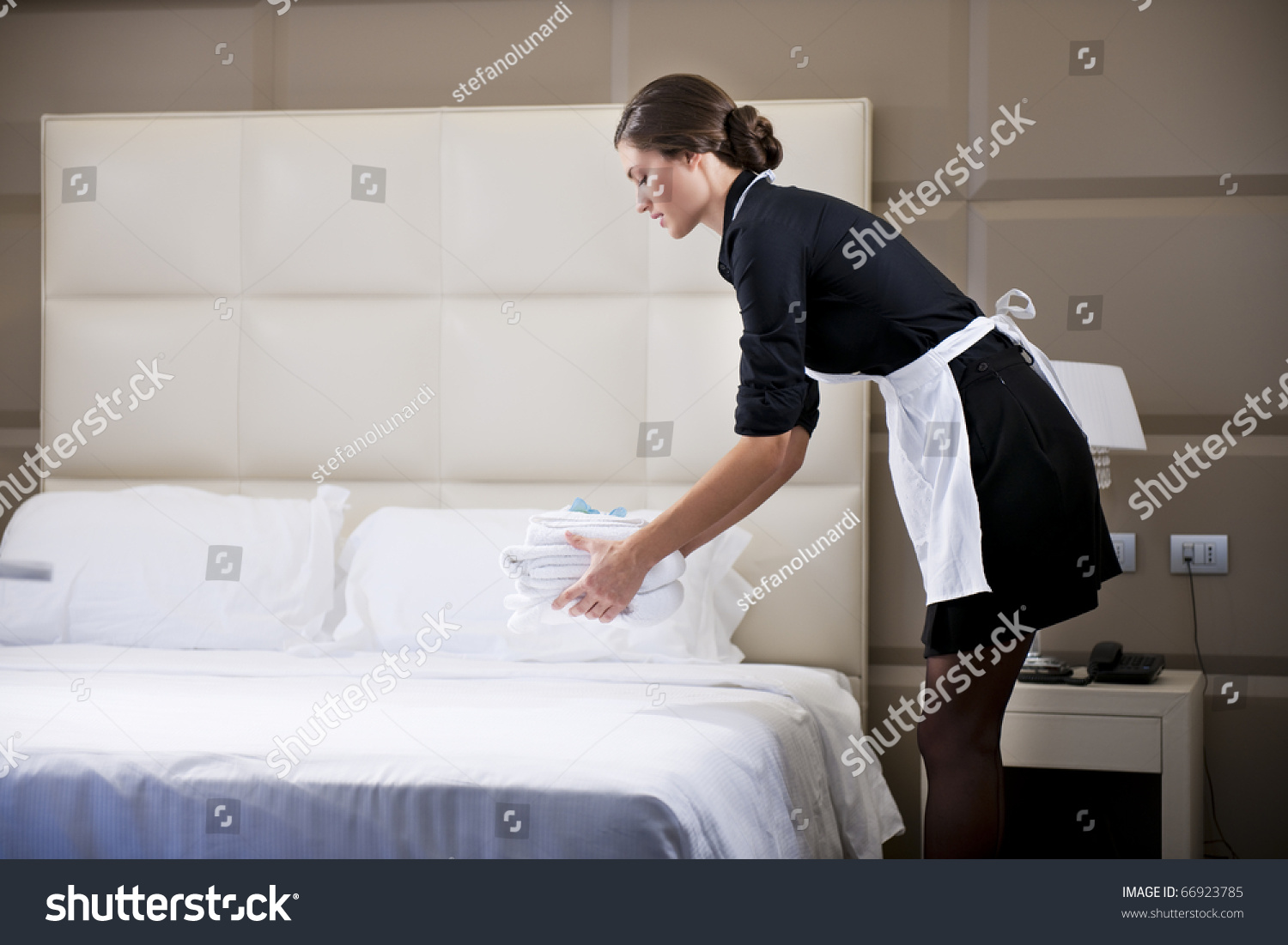 maid making bed hotel room stock photo 66923785 - shutterstock maid making bed hotel room stock photo 66923785 - shutterstock
