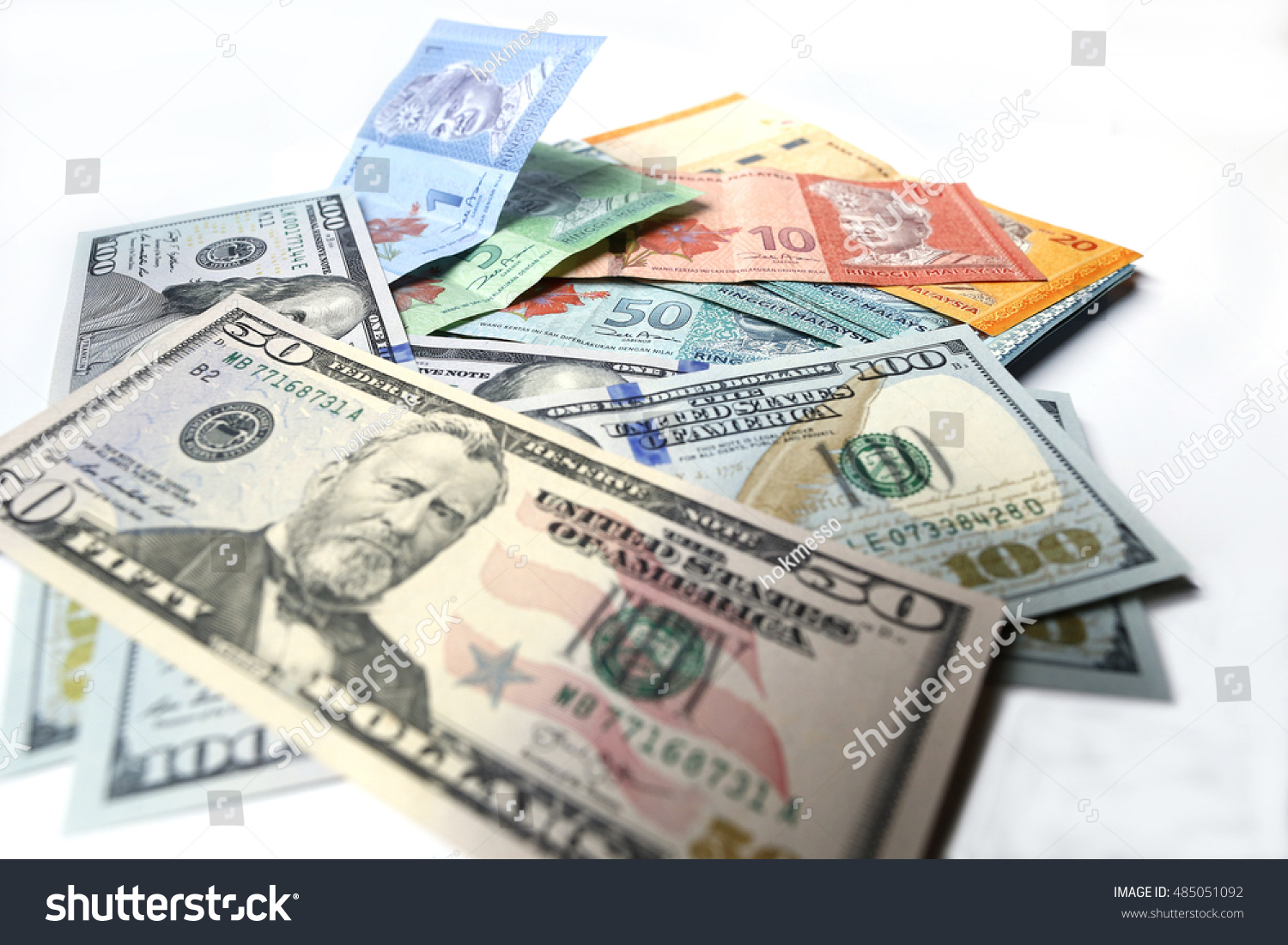 malaysian-ringgit-united-states-dollar-on-stock-photo-485051092