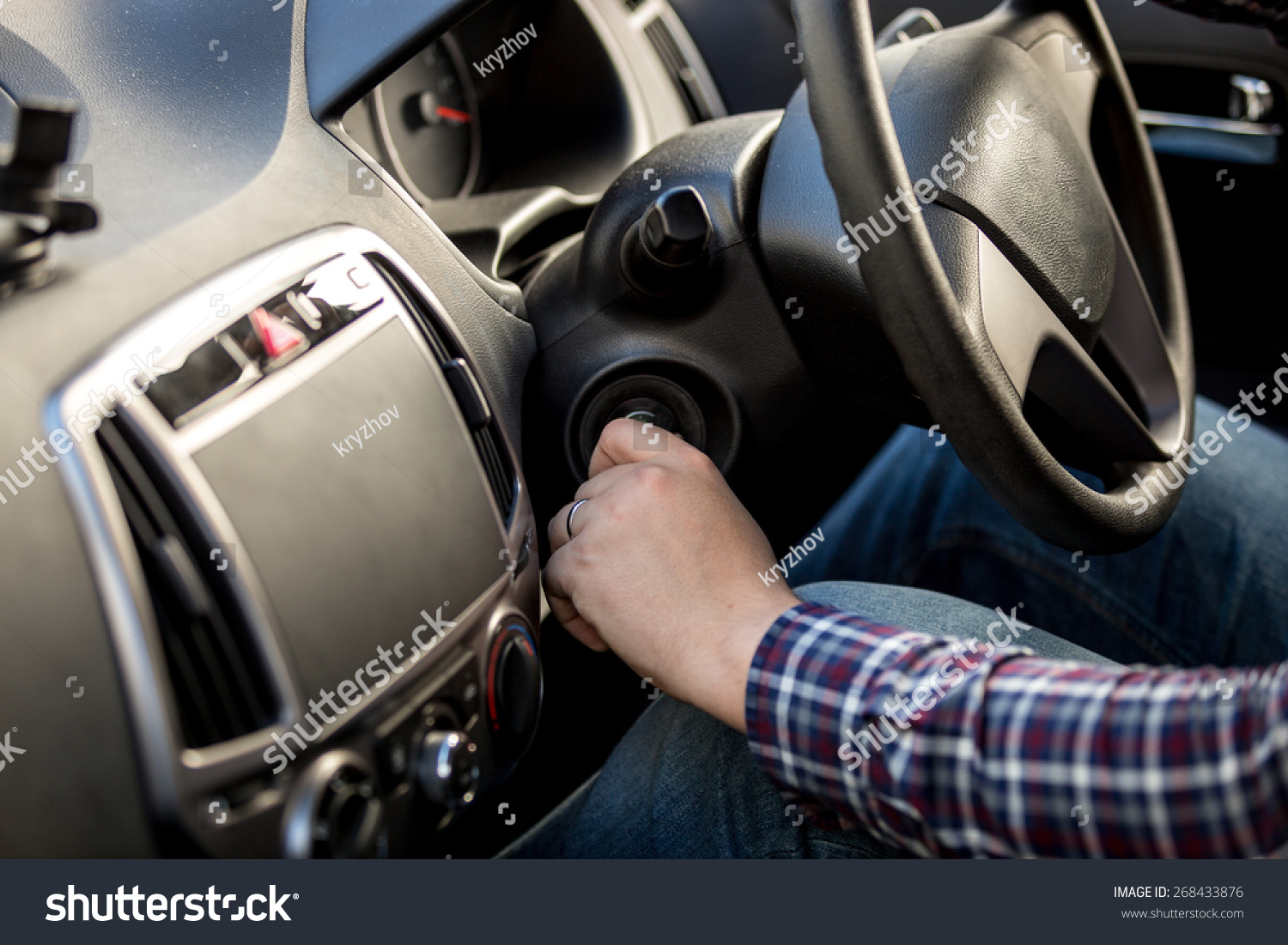 Male Driver Turning Ignition Key In Right-Hand Drive Car Stock Photo ...