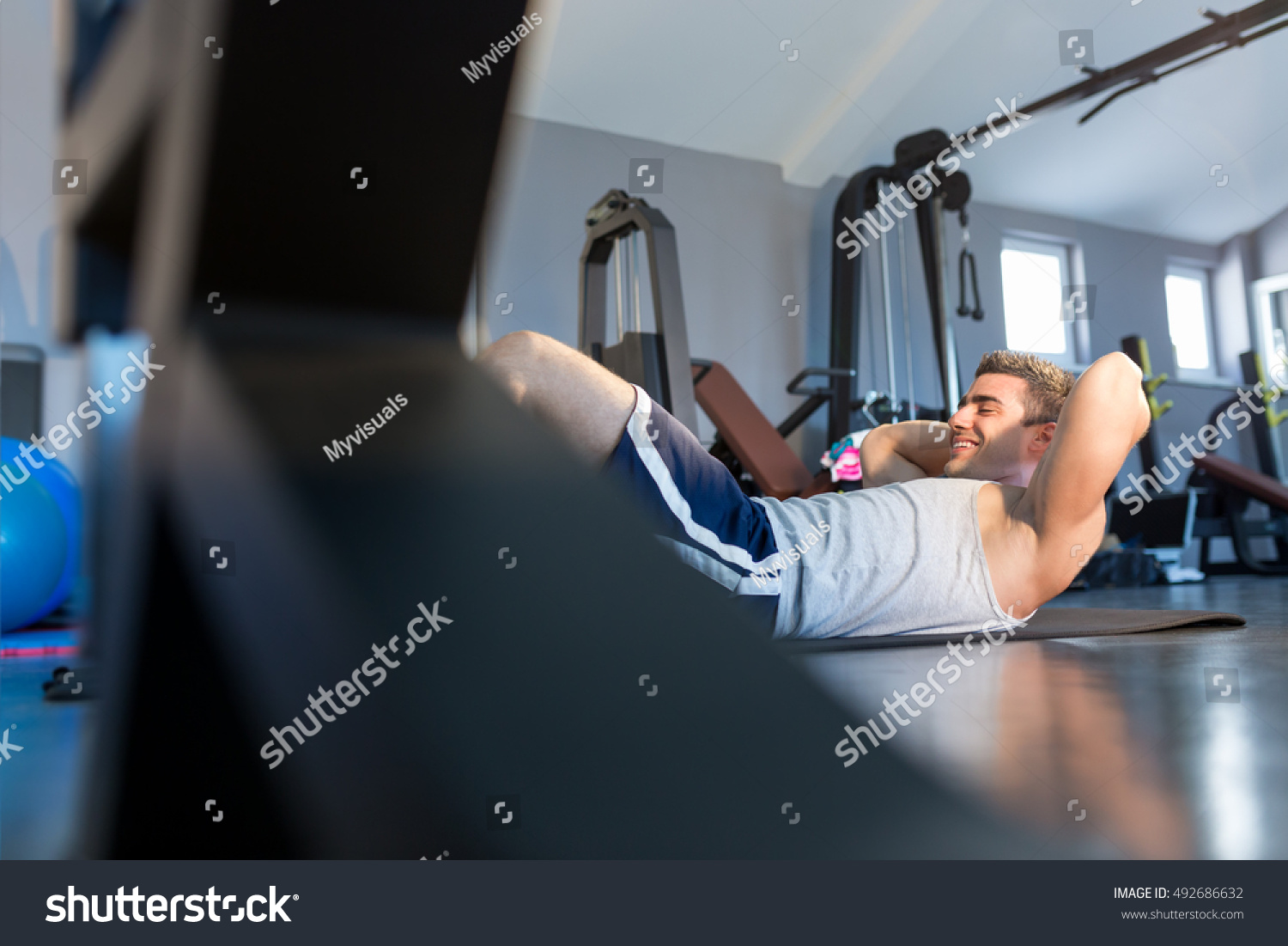 Male Fitness Model Doing Sit Ups Stock Photo 492686632 | Shutterstock