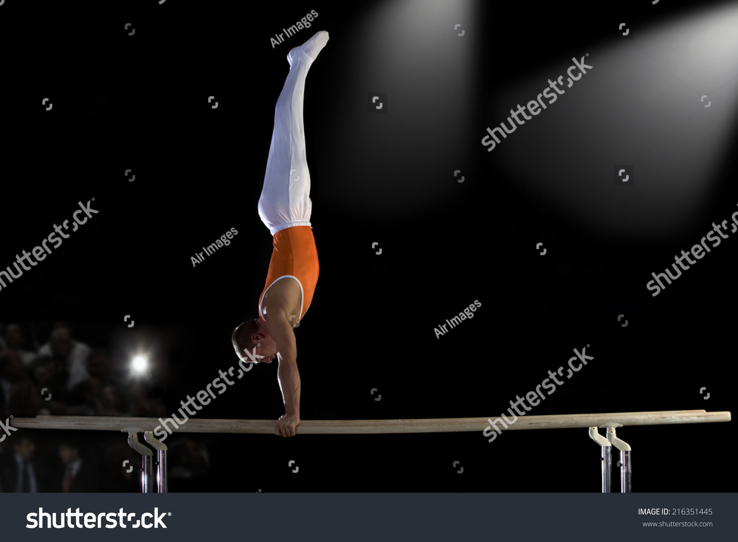 Male Gymnast Performing Handstand On Parallel Stock Photo Shutterstock