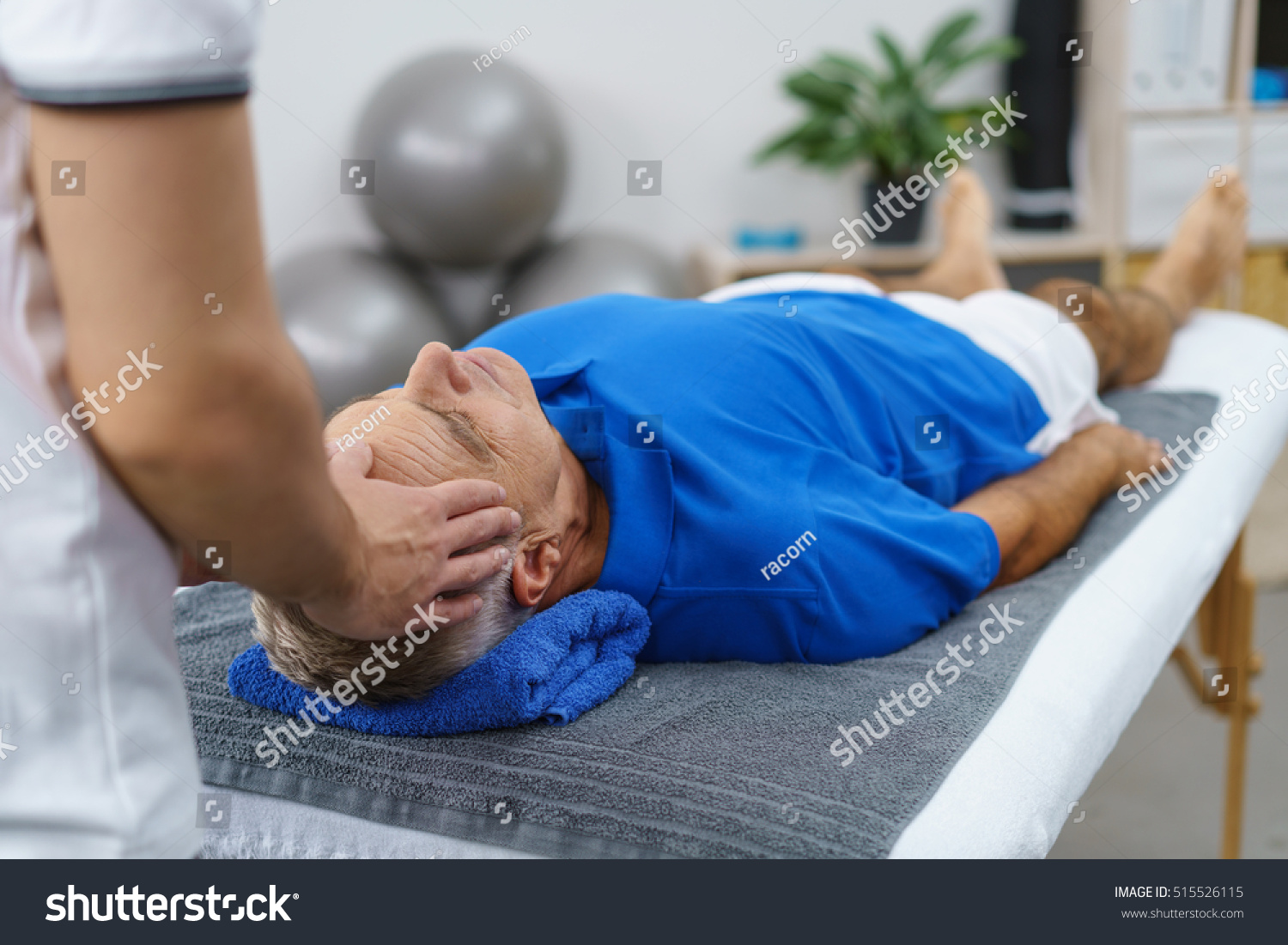 Male Physiotherapist Giving Head Massage Senior Stock Photo 51552611