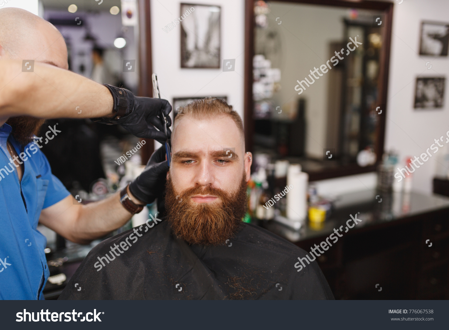 Male Professional Hairdresser Serving Client Shaving Stock Image