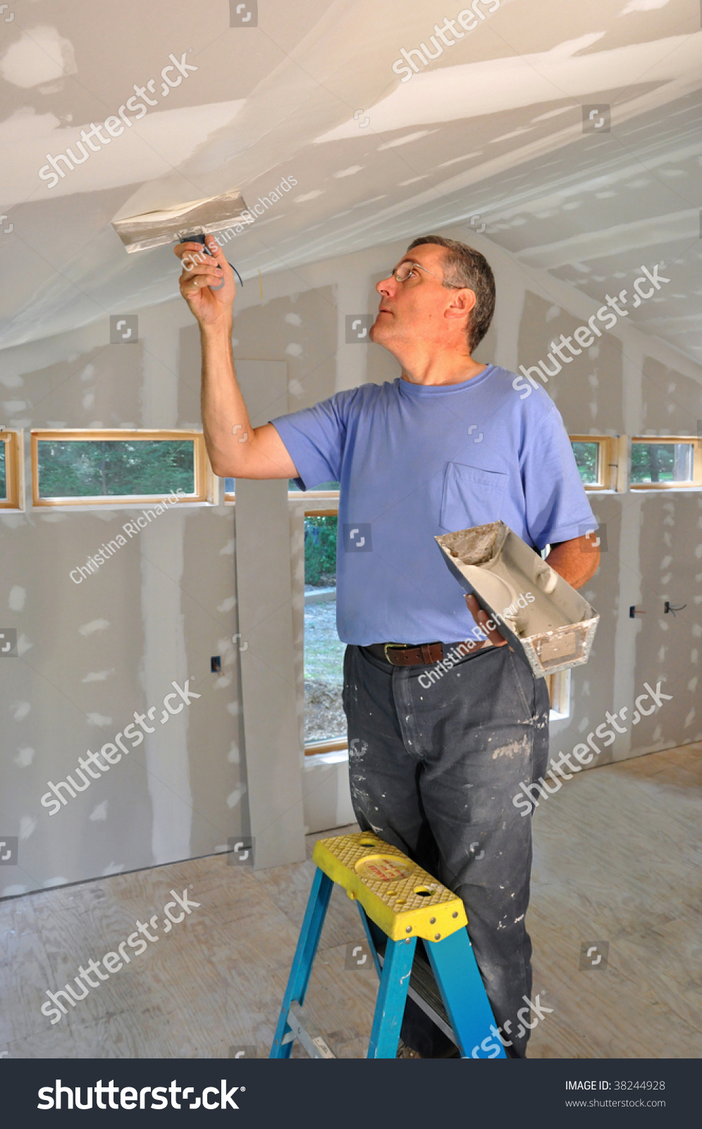 Man Applying Joint Compound Seams Between Stock Image Download Now