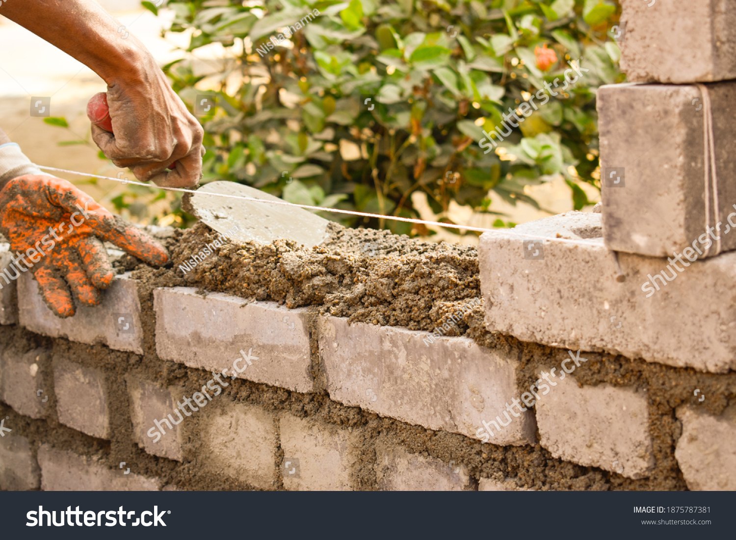 Man Building Concrete Bricks Wall Stock Photo 1875787381 