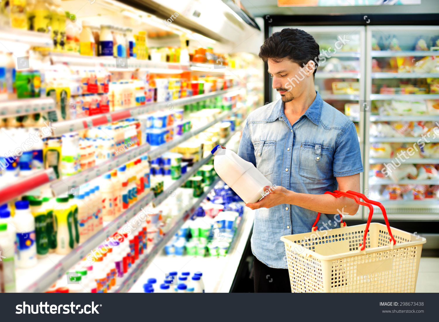 Man Buys Milk At The Supermarket Stock Photo 298673438 : Shutterstock