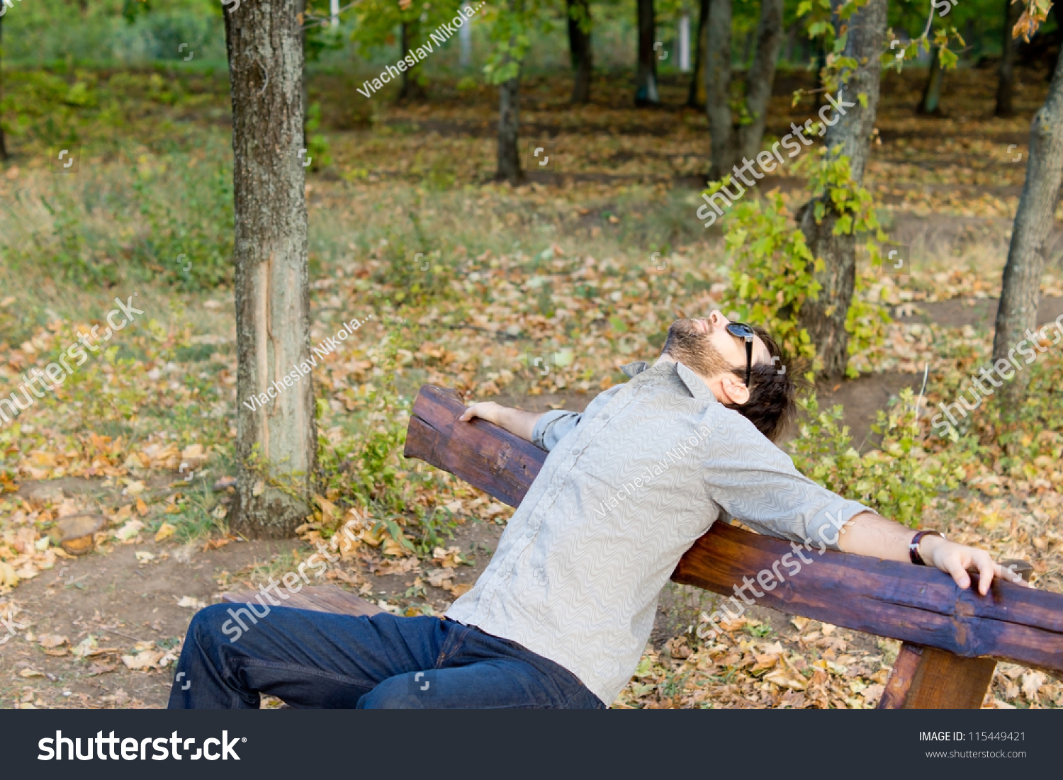 Man Enjoying Autumn Sunshine Sitting On Stock Photo 115449421 ...