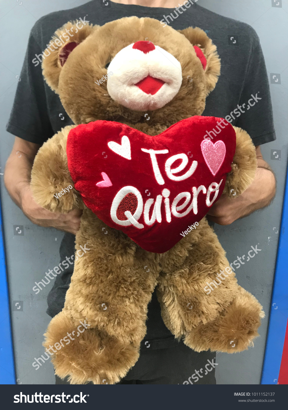Man Holding Teddy Bear Heart Spanish Stock Photo Edit Now