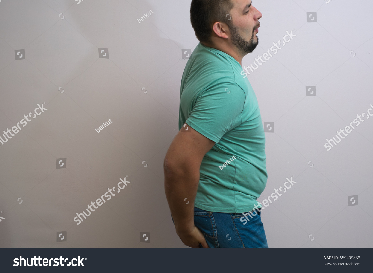 Man Holds His Ass Stock Photo Edit Now 659499838