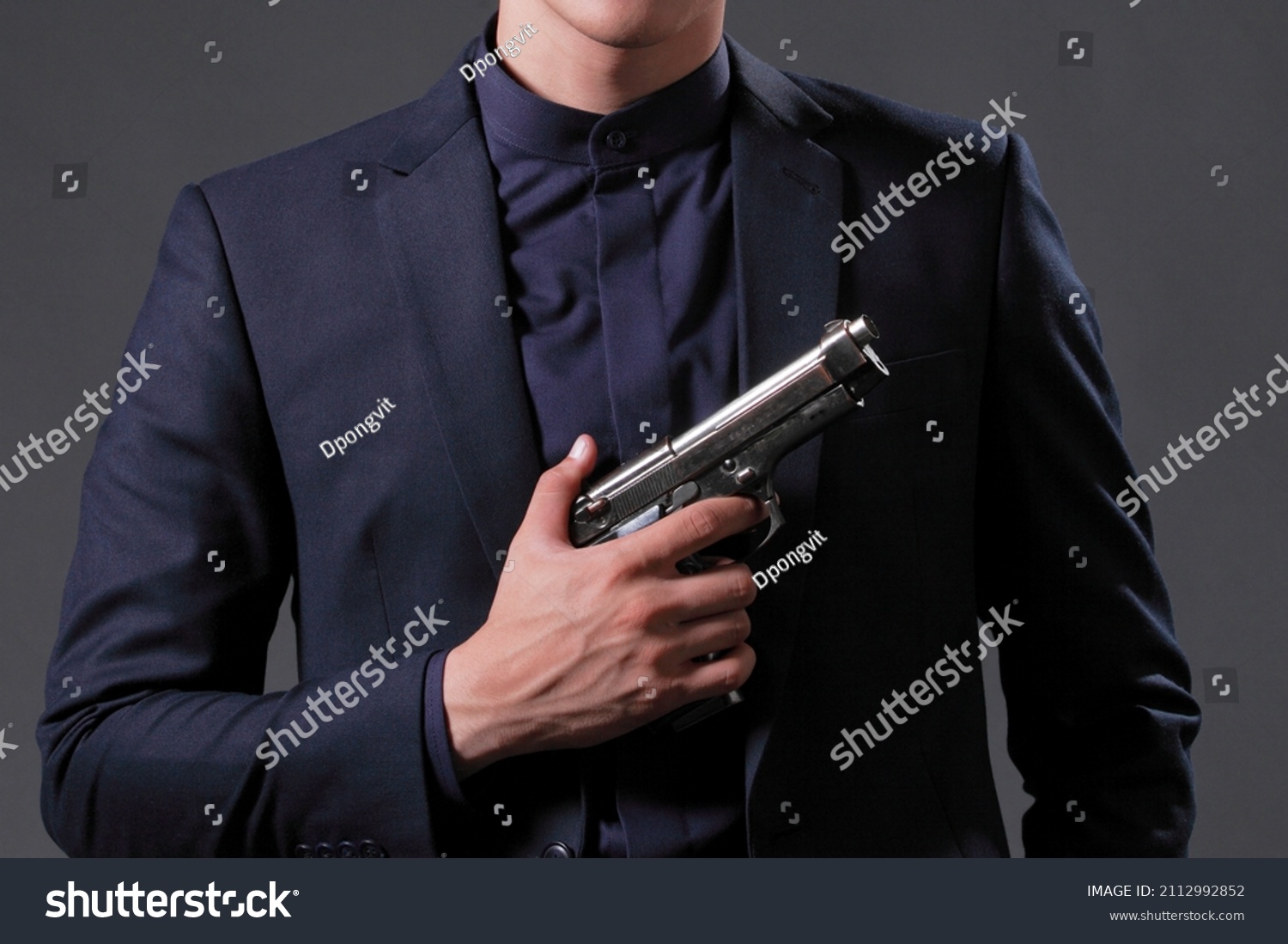 Man Suited Man Holding Gun Like Stock Photo (Edit Now) 2112992852