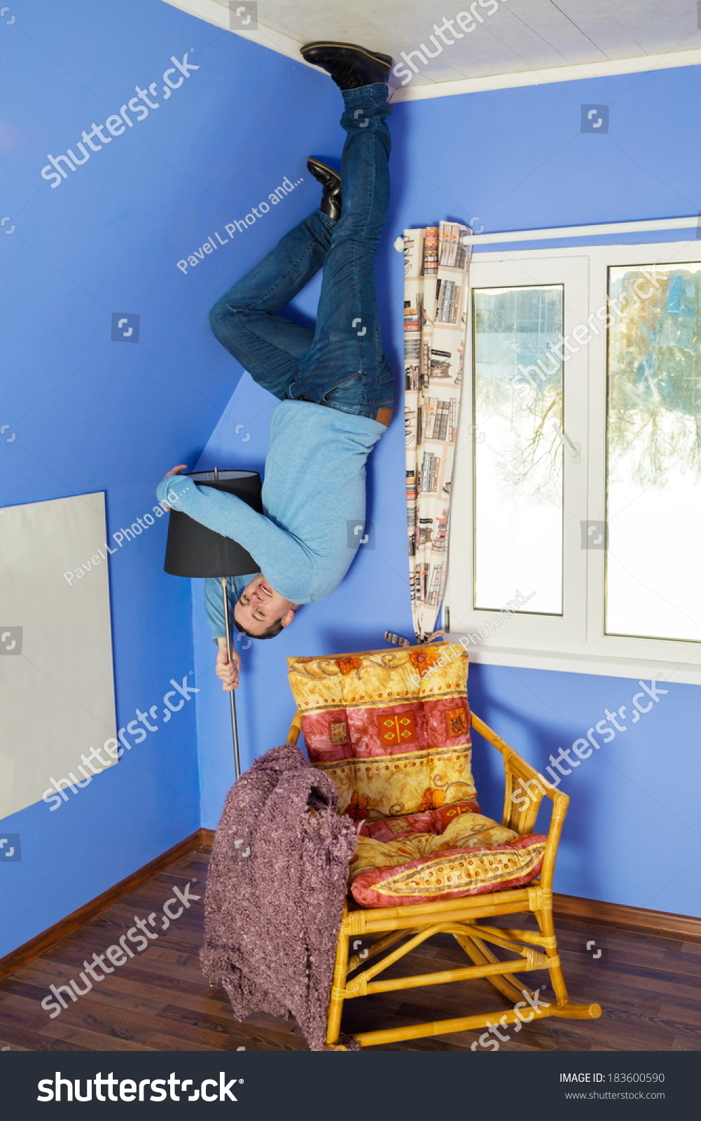 Man Jeans Standing On Ceiling Holding Stock Photo Edit Now