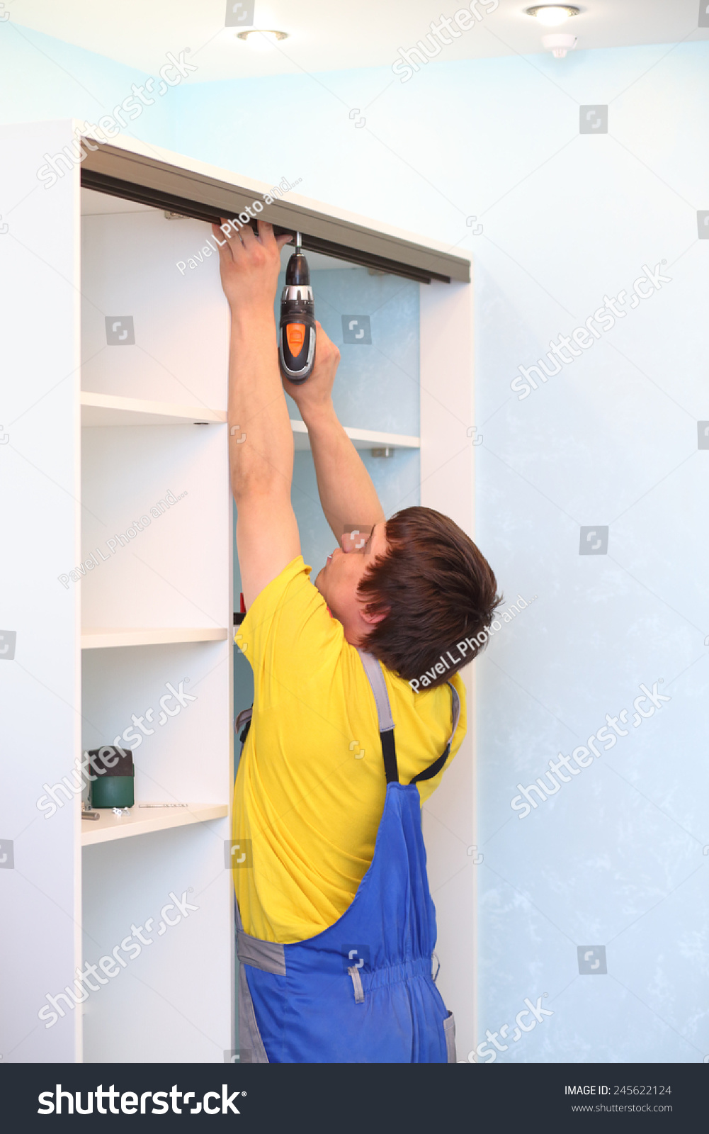 Man Installing Guide Rails Sliding Wardrobe Stock Photo Edit Now