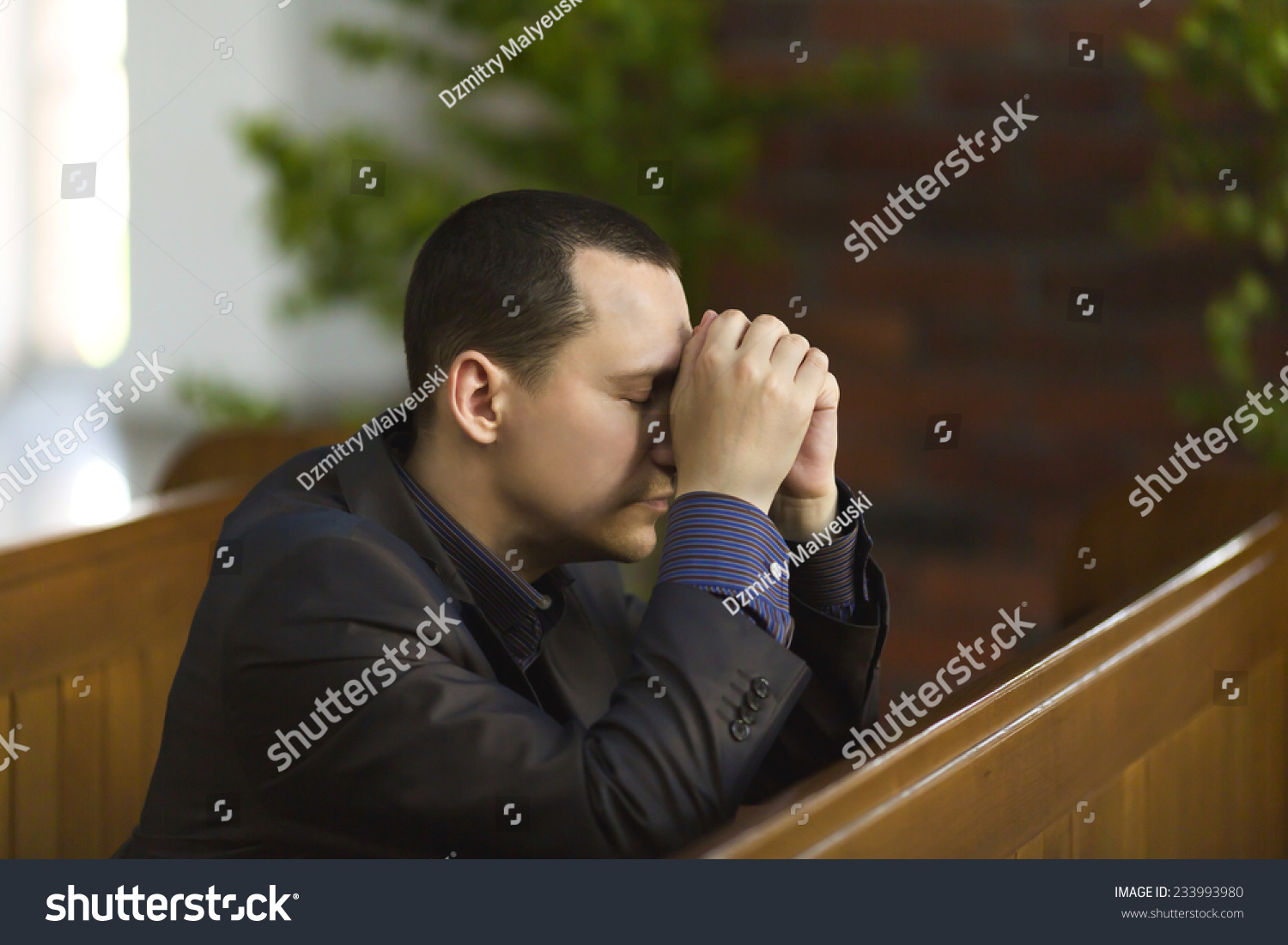 Man Praying In Church Stock Photo 233993980 : Shutterstock