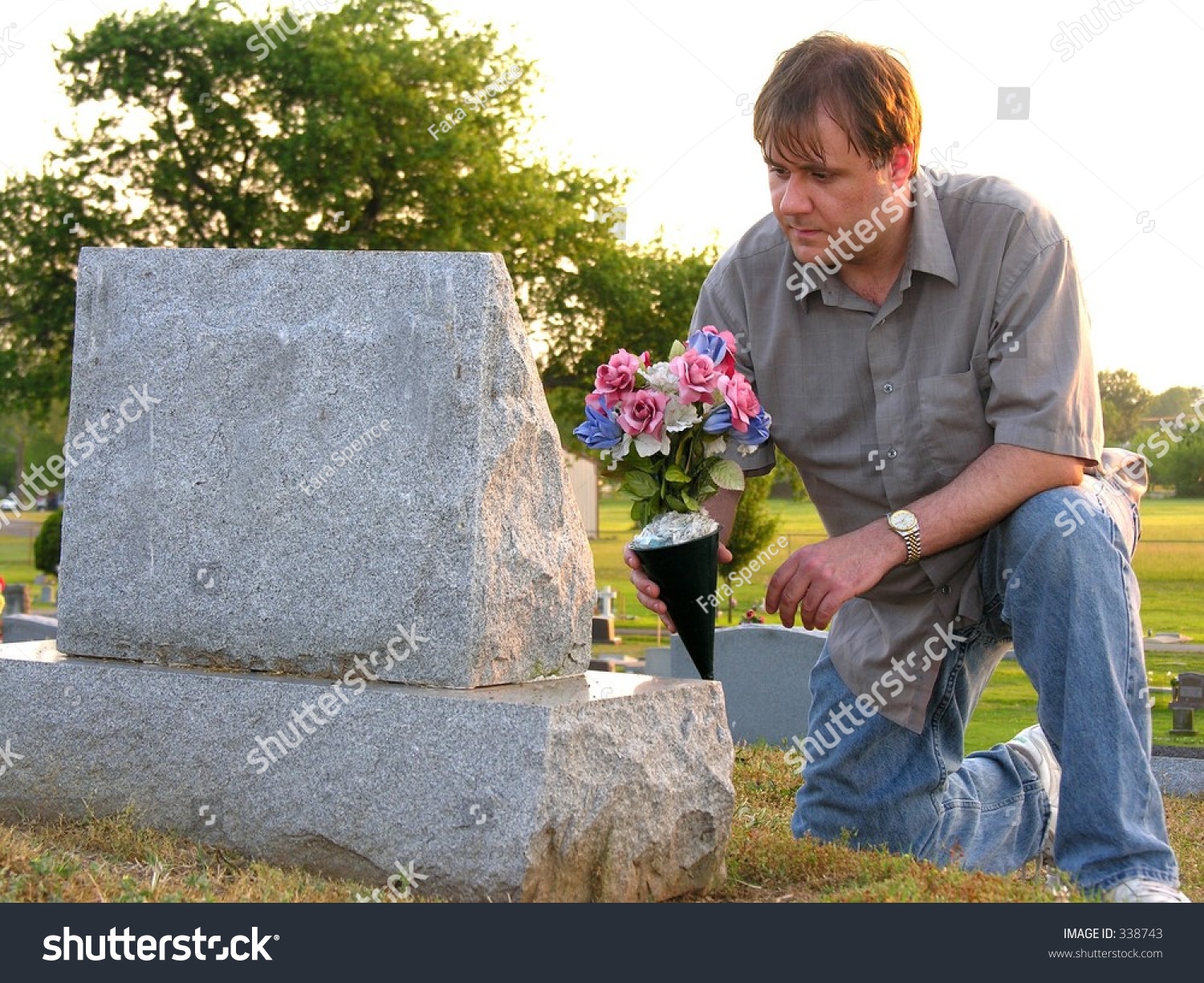 Man Putting Flowers On Grave Stock Photo 338743 : Shutterstock