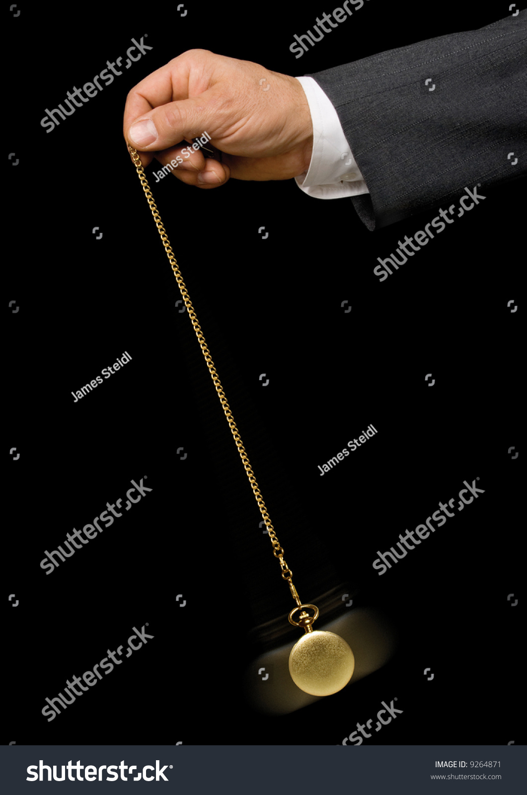 Man'S Hand Holding A Pocket Watch And Swinging It In The Fashion Of A ...